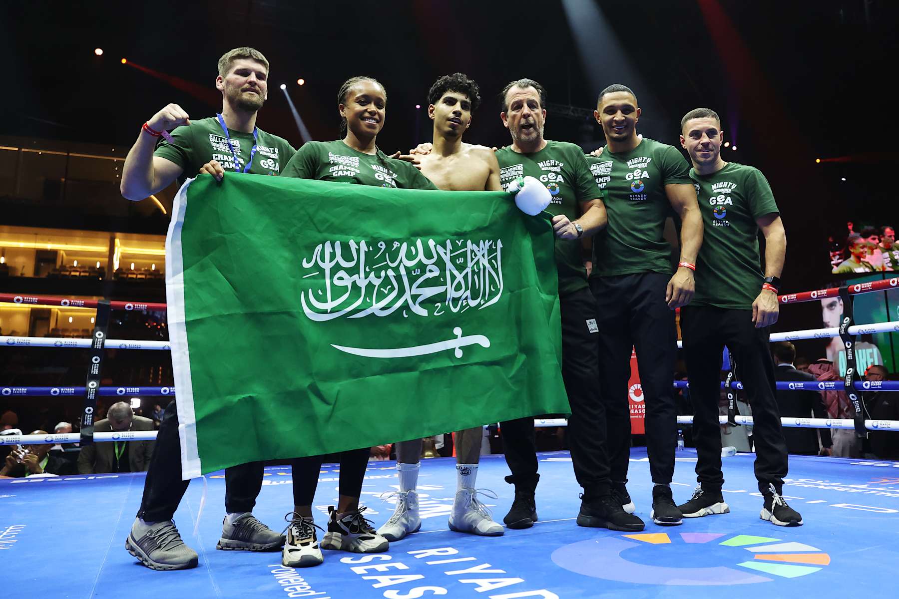 RIYADH, SAUDI ARABIA - OCTOBER 12: Mohammed Alakel celebrates victory with his team over Jesus Gonzalez (not pictured) during the Lightweight fight between Mohammed Alakel and Jesus Gonzalez as part of the Riyadh Season - IV Crown Showdown card at Kingdom Arena on October 12, 2024 in Riyadh. (Photo by Richard Pelham/Getty Images)