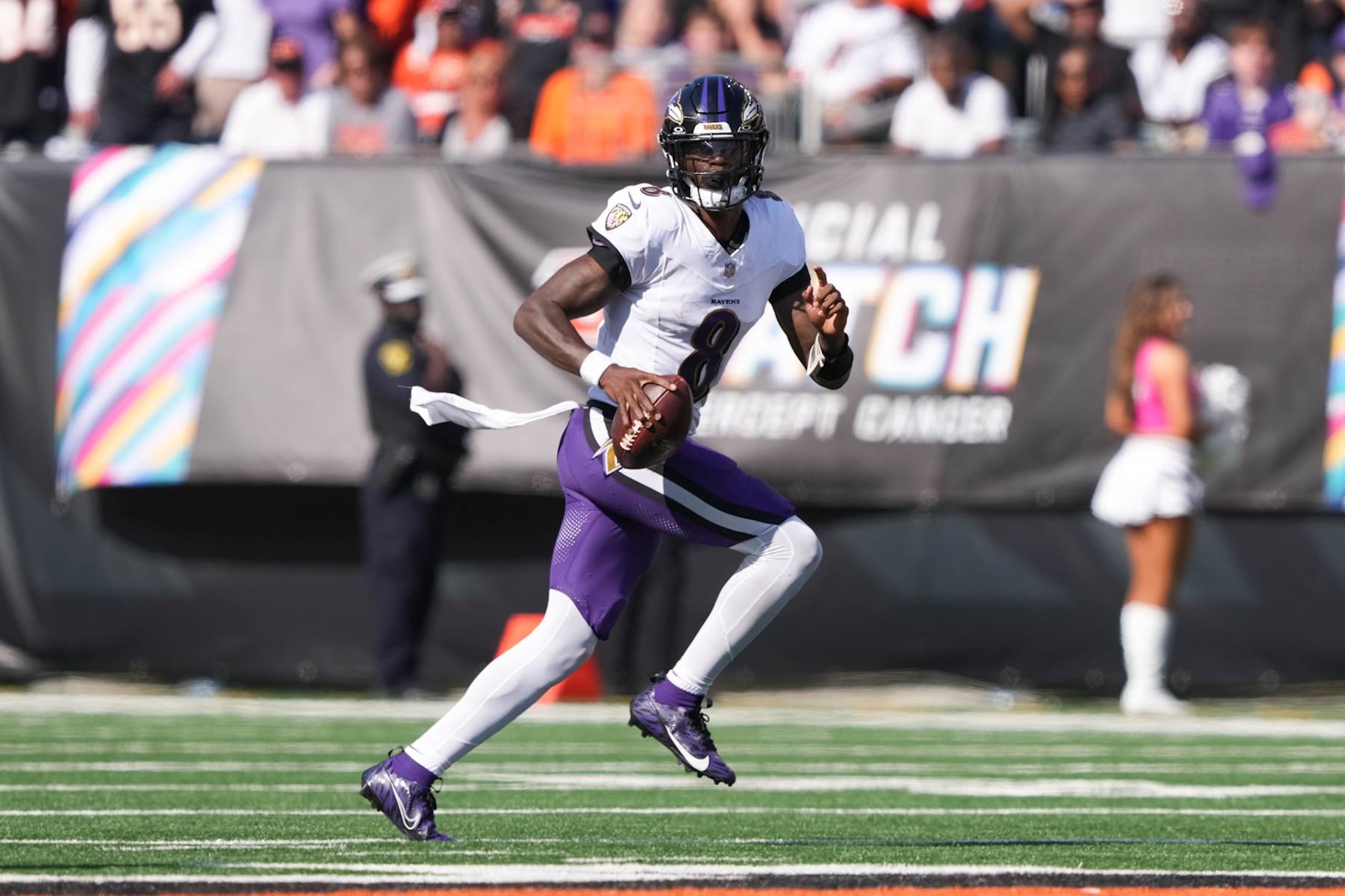 CINCINNATI, OHIO - OCTOBER 06: Lamar Jackson #8 of the Baltimore Ravens runs with the ball in the fourth quarter against the Cincinnati Bengals at Paycor Stadium on October 06, 2024 in Cincinnati, Ohio. (Photo by Dylan Buell/Getty Images) CINCINNATI, OHIO - OCTOBER 06: Lamar Jackson #8 of the Baltimore Ravens runs with the ball in the fourth quarter against the Cincinnati Bengals at Paycor Stadium on October 06, 2024 in Cincinnati, Ohio. (Photo by Dylan Buell/Getty Images)