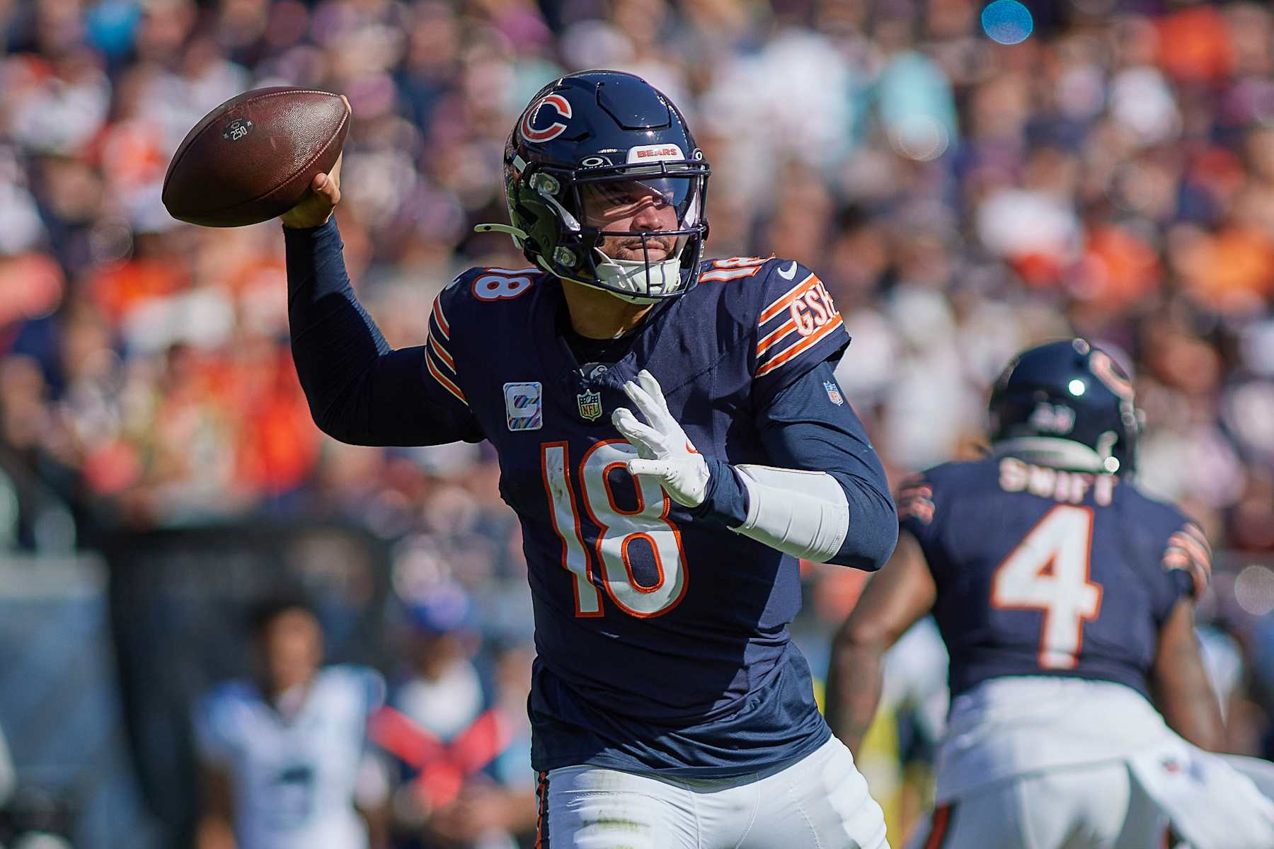 CHICAGO, IL - OCTOBER 06: Chicago Bears quarterback Caleb Williams (18) throws the football in action during a game between the Chicago Bears and the Carolina Panthers on October 06, 2024 at Soldier Field, in Chicago, IL. (Photo by Robin Alam/Icon Sportswire via Getty Images)