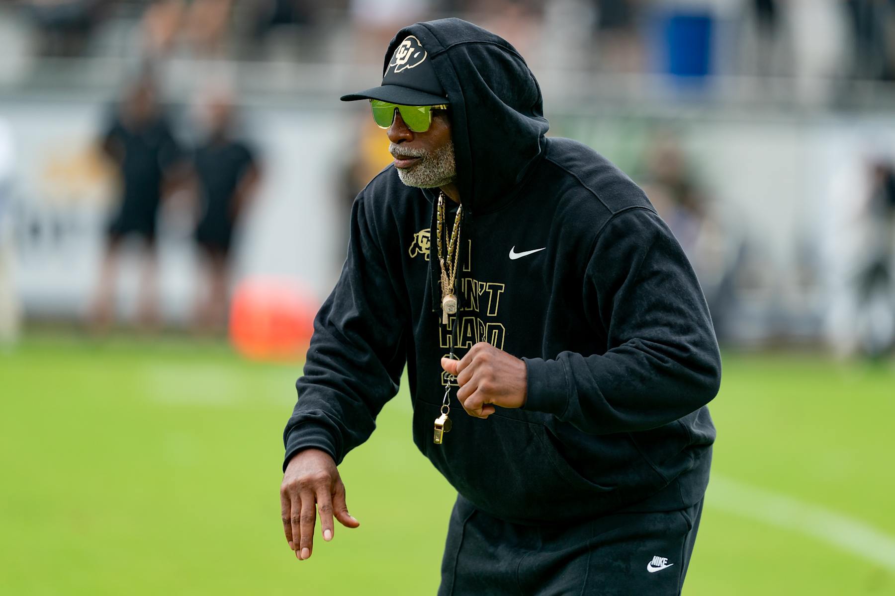ORLANDO, FL - SEPTEMBER 28:  Colorado Buffaloes head coach Deion Sanders dances during warm ups before a college football game between the Colorado Buffaloes and the UCF Knights on September 28th, 2024 at FBC Mortgage Stadium in Orlando, FL. (Photo by Chris Leduc/Icon Sportswire via Getty Images)