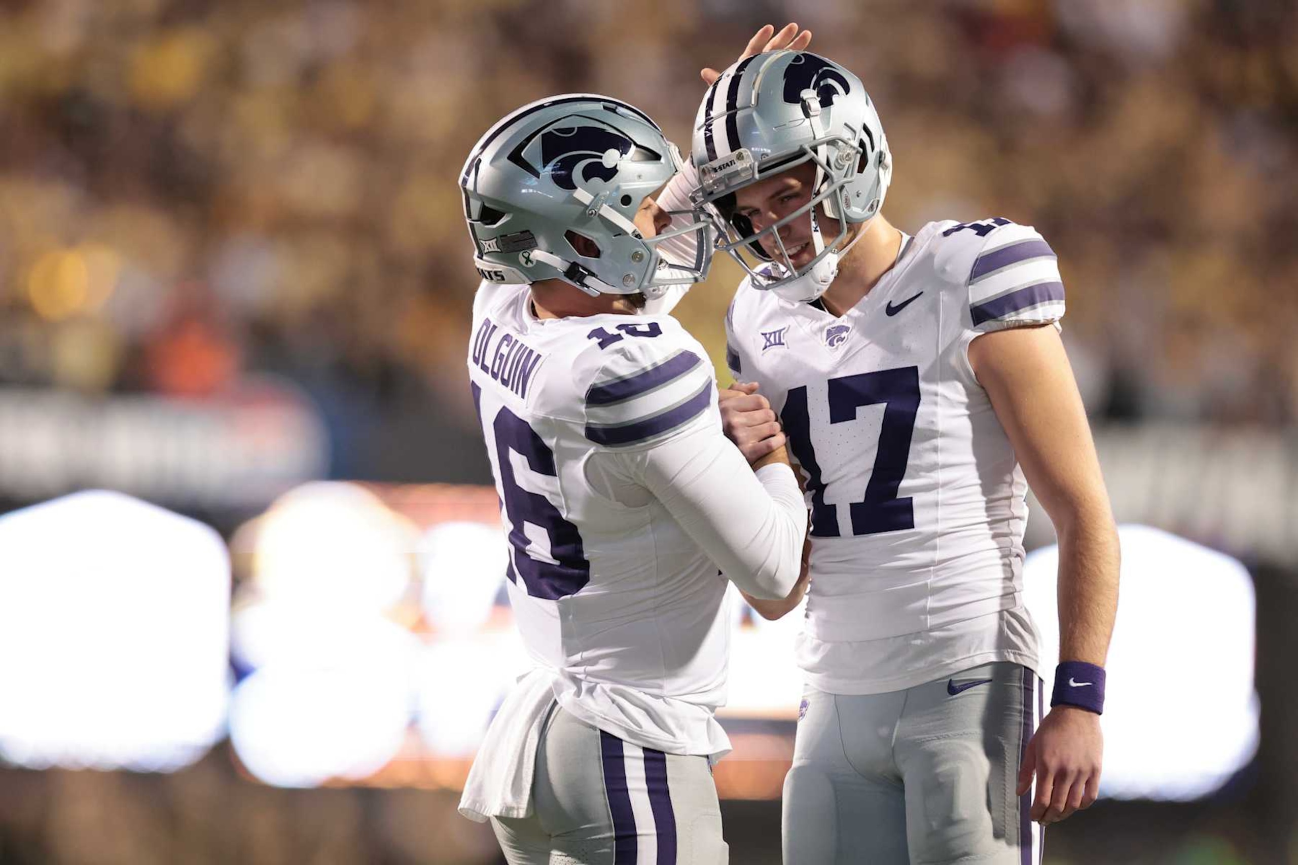 BOULDER, COLORADO - OCTOBER 12: Mason Olguin #16 and Mikey Bergeron #17 of the Kansas State Wildcats celebrate a field goal during the first quarter against the Colorado Buffaloes at Folsom Field on October 12, 2024 in Boulder, Colorado. (Photo by Andrew Wevers/Getty Images)