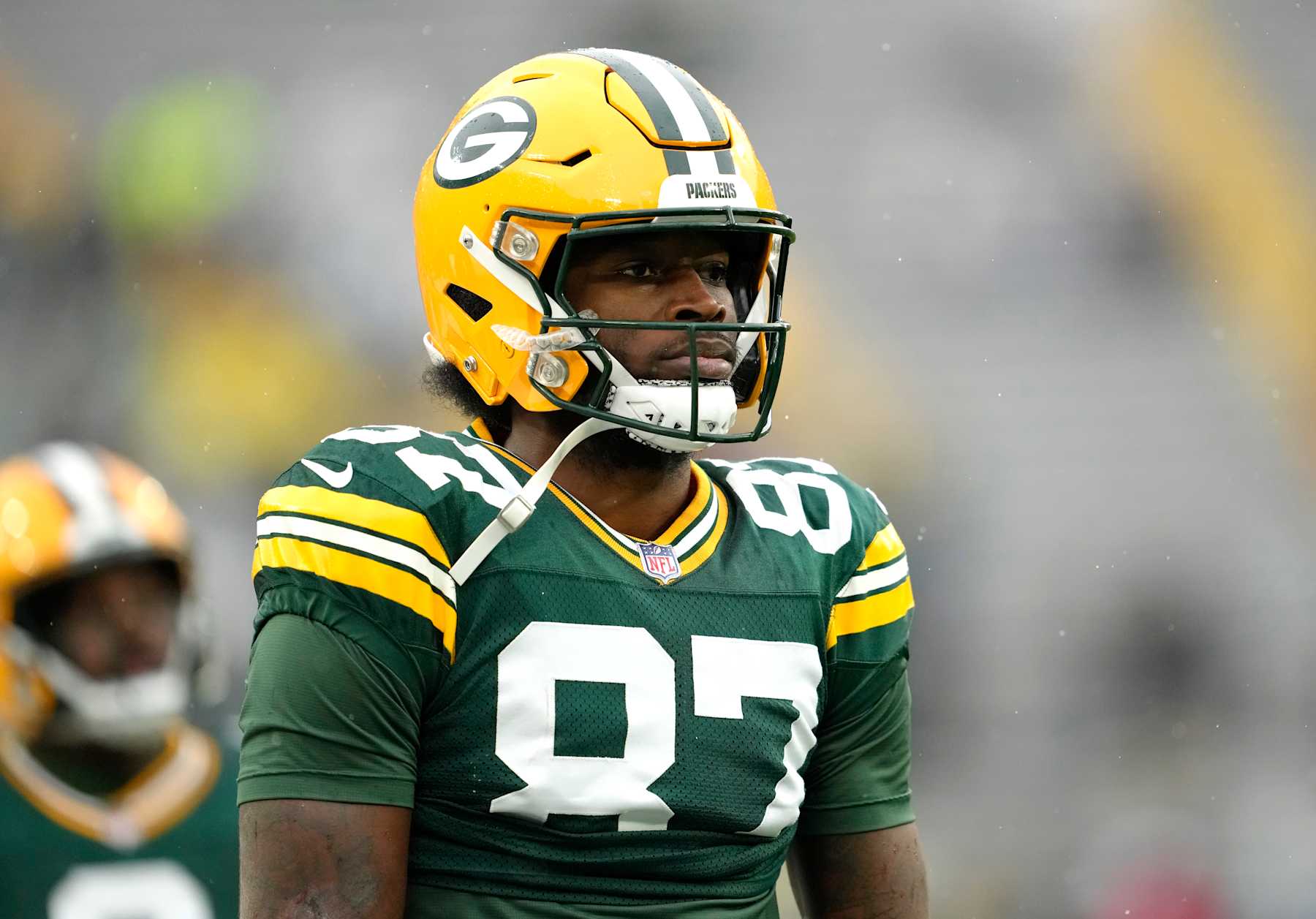 GREEN BAY, WISCONSIN - OCTOBER 13: Romeo Doubs #87 of the Green Bay Packers warms up prior to playing the Arizona Cardinals at Lambeau Field on October 13, 2024 in Green Bay, Wisconsin. (Photo by Patrick McDermott/Getty Images)