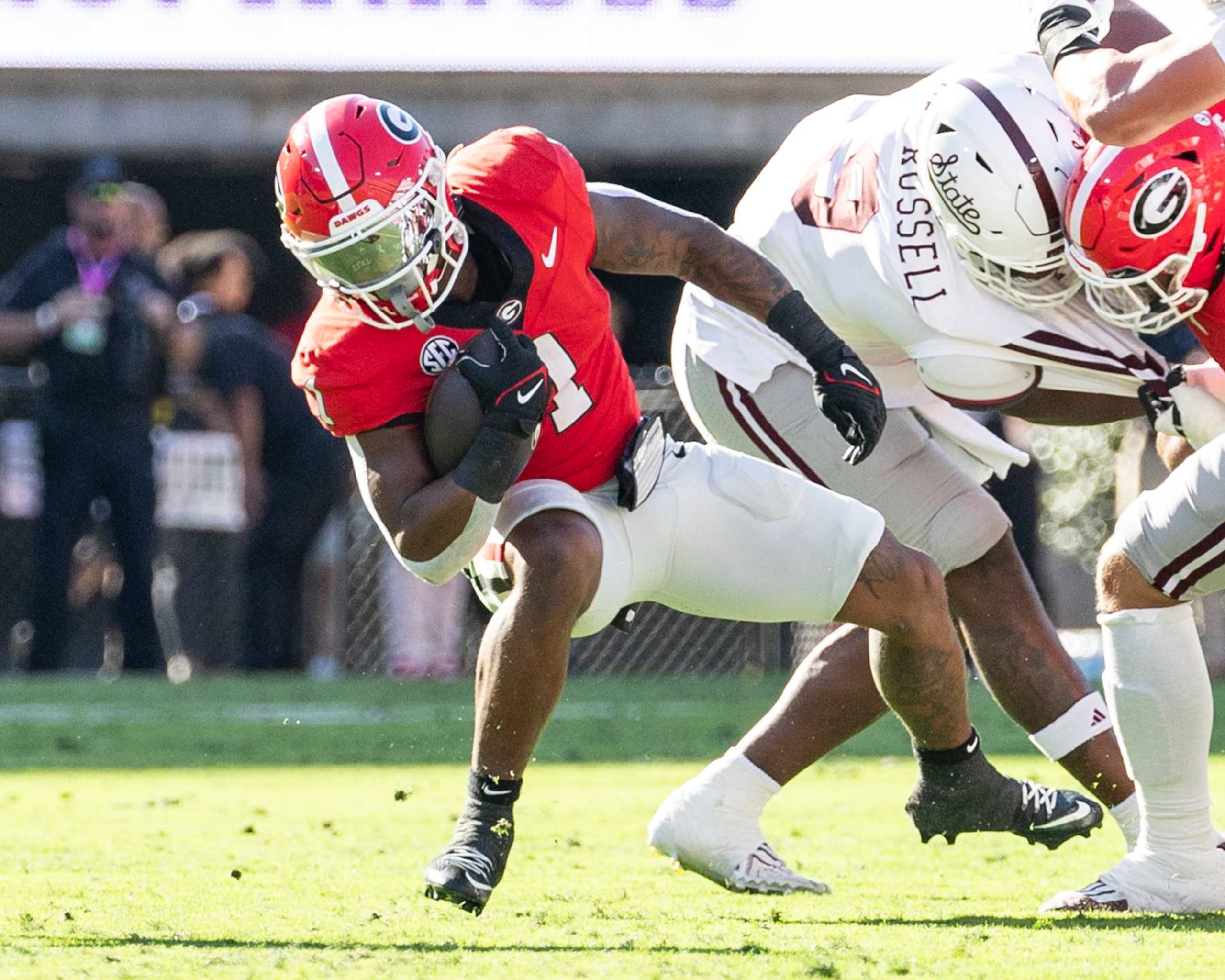 ATHENS, GEORGIA - OCTOBER 12: Trevor Etienne #1 of the Georgia Bulldogs runs with the ball during a game between the Mississippi State Bulldogs and the Georgia Bulldogs at Sanford Stadium on October 12, 2024 in Athens, Georgia. (Photo by Steve Limentani/ISI Photos/Getty Images)