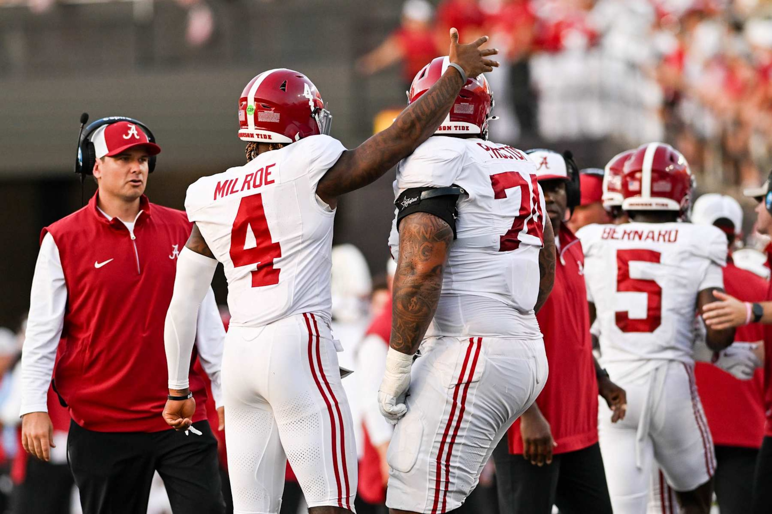 NASHVILLE, TENNESSEE - OCTOBER 5: Jalen Milroe #4 and Kadyn Proctor #74 of the Alabama Crimson Tide celebrate a touchdown against the Vanderbilt Commodores in the second half at FirstBank Stadium on October 5, 2024 in Nashville, Tennessee. (Photo by Carly Mackler/Getty Images)