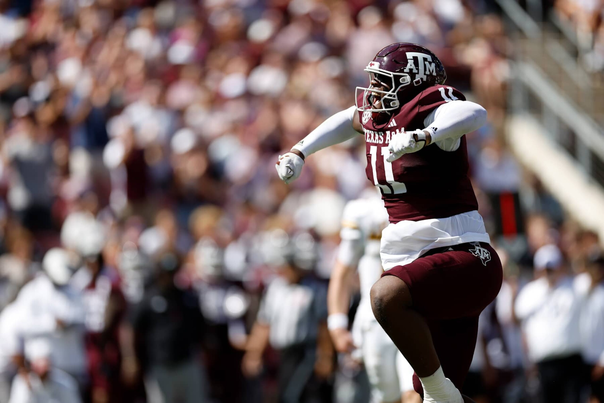 COLLEGE STATION, TEXAS - OCTOBER 05: Nic Scourton #11 of the Texas A&M Aggies reacts after a tackle in the first half against the Missouri Tigers at Kyle Field on October 05, 2024 in College Station, Texas. (Photo by Tim Warner/Getty Images)