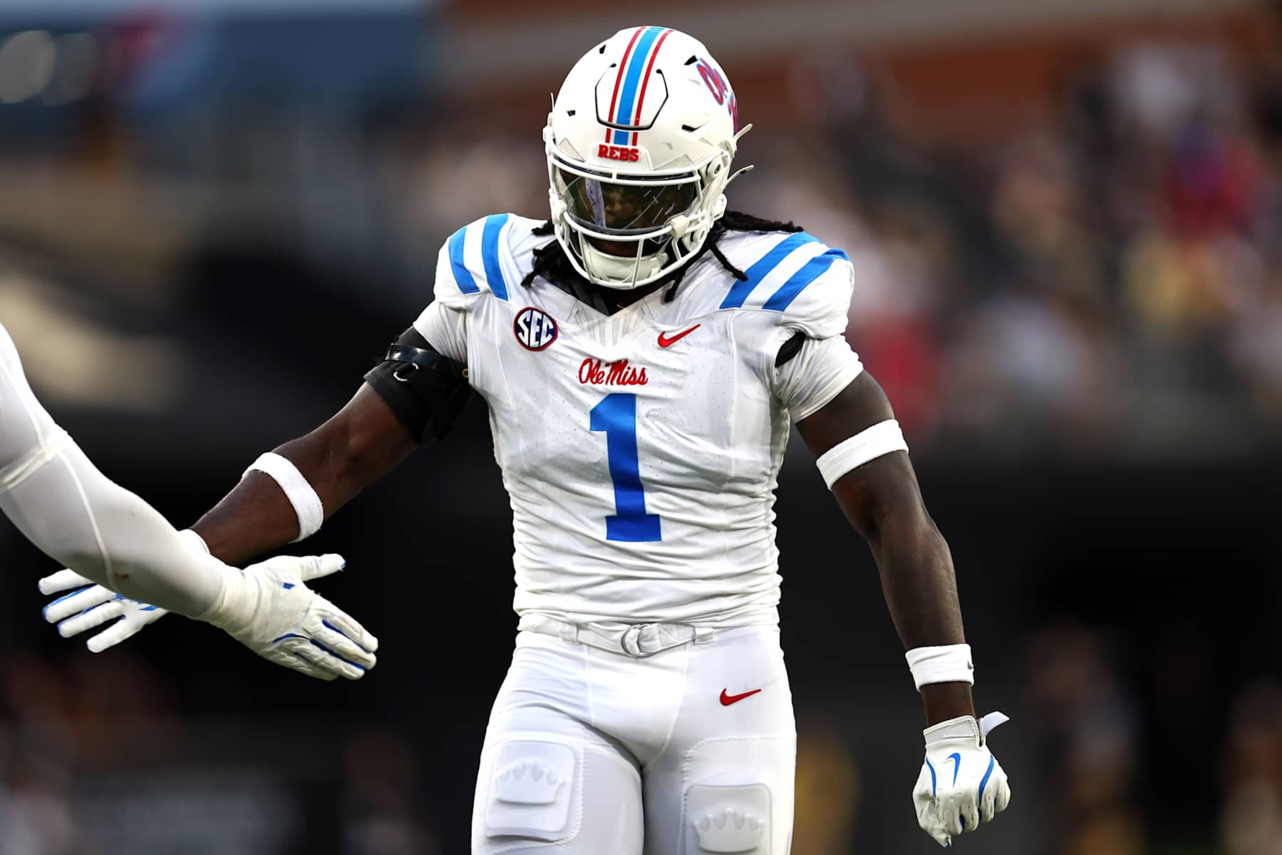 WINSTON-SALEM, NORTH CAROLINA - SEPTEMBER 14: Princely Umanmielen #1 of the Mississippi Rebels reacts after a play during the first half of a football game against the Wake Forest Demon Deacons at Allegacy Federal Credit Union Stadium on September 14, 2024 in Winston-Salem, North Carolina.  (Photo by David Jensen/Getty Images)