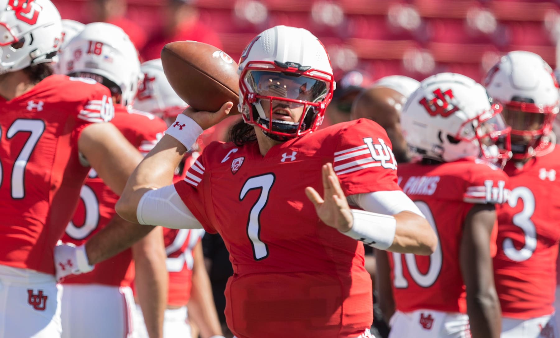 SALT LAKE CITY, UT -  SEPTEMBER 25 :  Cam Rising #7 of the Utah Utes throws a pass during warmups before their game against the Washington State Cougars September 25, 2021 at Rice Eccles Stadium in Salt Lake City, Utah. (Photo by Chris Gardner/Getty Images)