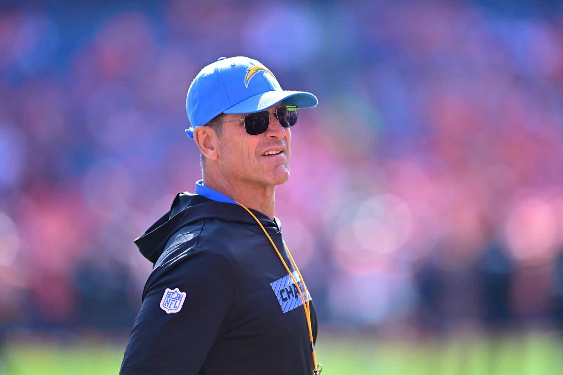 DENVER, COLORADO - OCTOBER 13: Head coach Jim Harbaugh
of the Los Angeles Chargers looks on prior to a game against the Denver Broncos at Empower Field At Mile High on October 13, 2024 in Denver, Colorado. (Photo by Dustin Bradford/Getty Images)