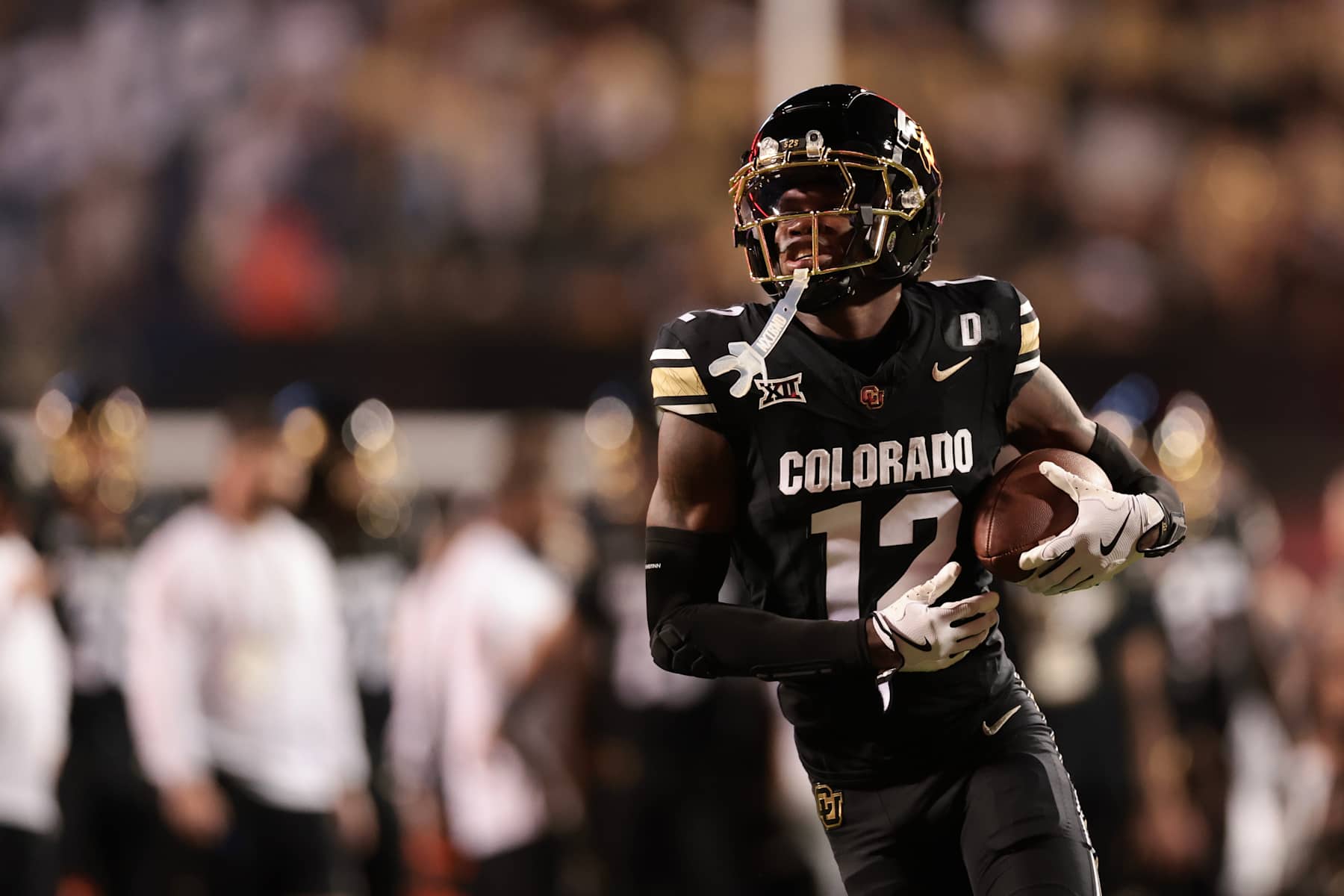 BOULDER, COLORADO - OCTOBER 12: Travis Hunter #12 of the Colorado Buffaloes warms up prior to the game against the Kansas State Wildcats at Folsom Field on October 12, 2024 in Boulder, Colorado. (Photo by Andrew Wevers/Getty Images)