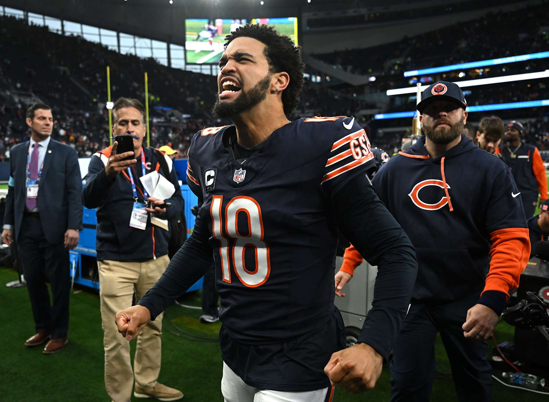 LONDON, ENGLAND - OCTOBER 13: Caleb Williams of Chicago Bears celebrates victory in the NFL match between Jacksonville Jaguars and Chicago Bears at Tottenham Hotspur Stadium on October 13, 2024 in London, England. (Photo by Harry Murphy/Getty Images)