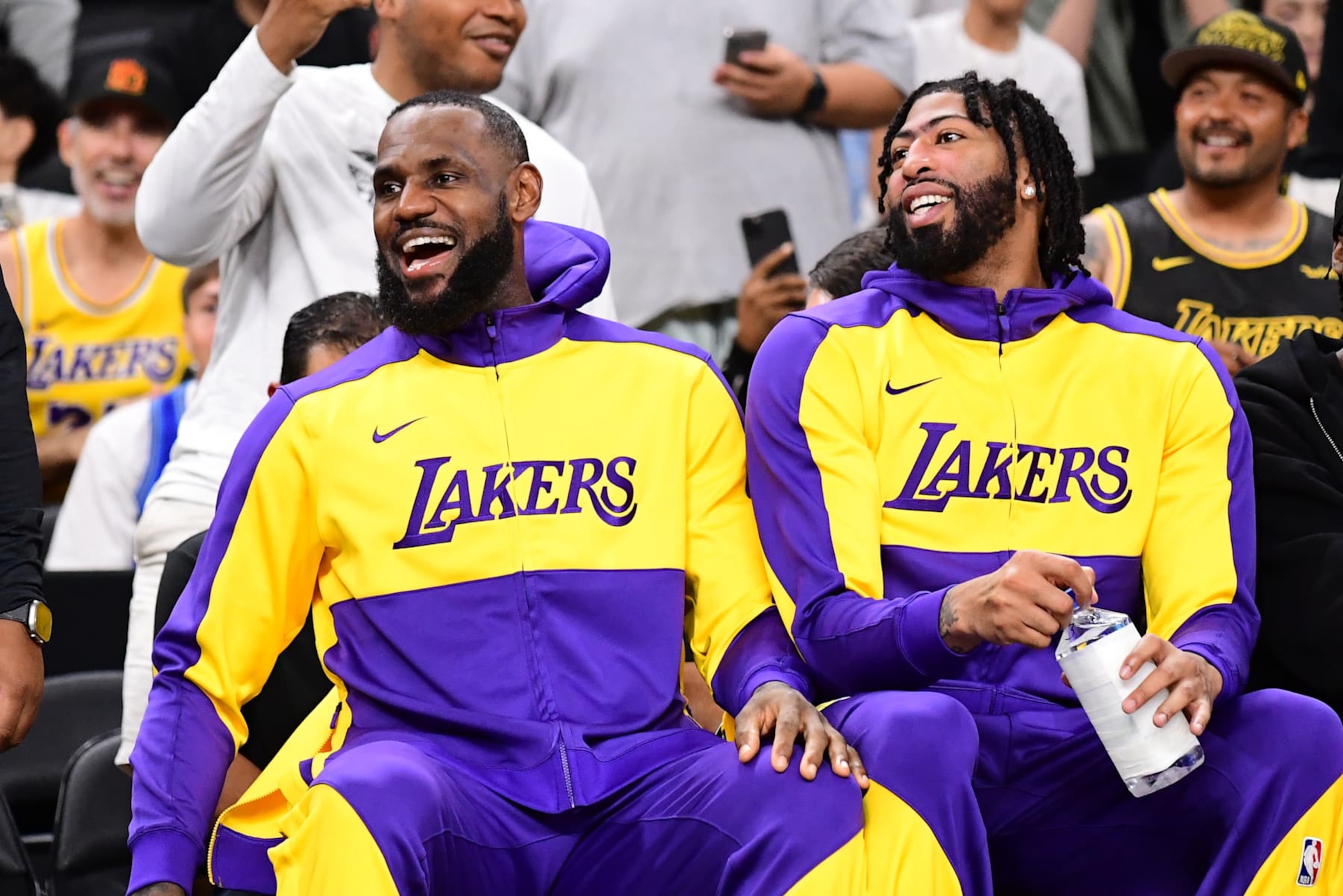 LOS ANGELES, CA - OCTOBER 6:  LeBron James #23 and Anthony Davis #3 of the Los Angeles Lakers sits on the bench against the Phoenix Suns  on October 6, 2024 at Acrisure Arena in Palm Springs, California. NOTE TO USER: User expressly acknowledges and agrees that, by downloading and/or using this Photograph, user is consenting to the terms and conditions of the Getty Images License Agreement. Mandatory Copyright Notice: Copyright 2024 NBAE (Photo by Adam Pantozzi/NBAE via Getty Images)