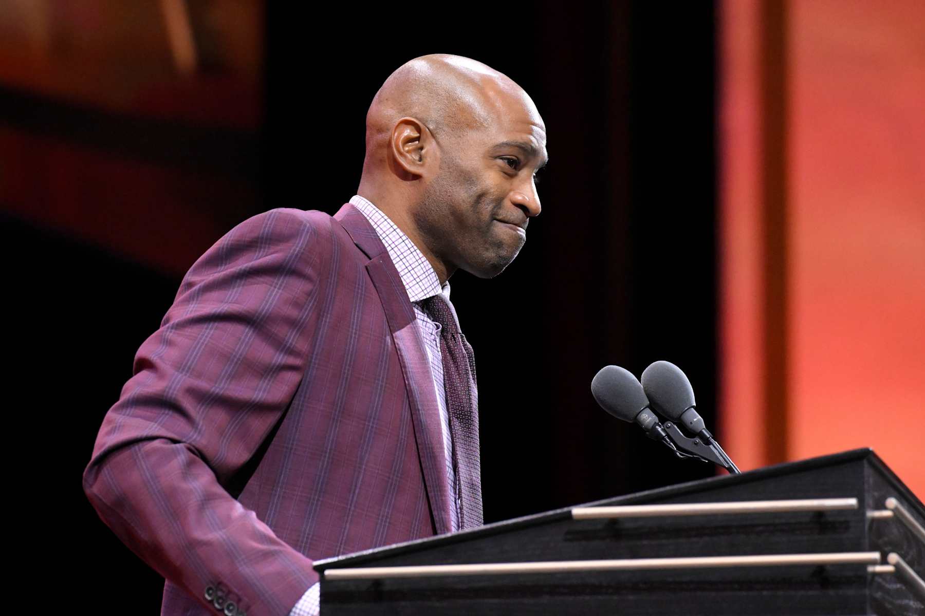SPRINGFIELD, MA - OCTOBER 13: Inductee Vince Carter speaks during the 2024 Basketball Hall of Fame Enshrinement Ceremony on October 13, 2024 at Symphony Hall in Springfield, Massachusetts. NOTE TO USER: User expressly acknowledges and agrees that, by downloading and/or using this photograph, user is consenting to the terms and conditions of the Getty Images License Agreement. Mandatory Copyright Notice: Copyright 2024 NBAE (Photo by David Dow/NBAE via Getty Images)