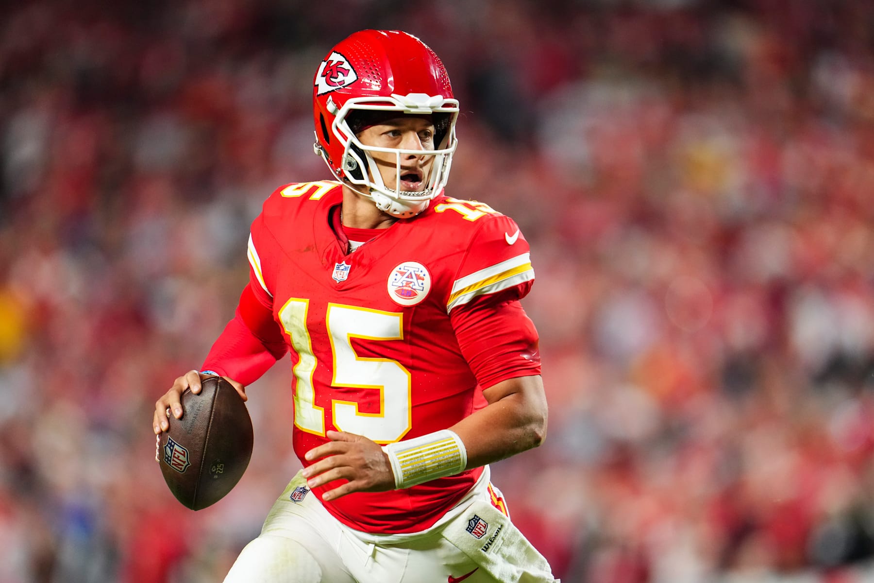 KANSAS CITY, MO - OCTOBER 07: Patrick Mahomes #15 of the Kansas City Chiefs scrambles out of the pocket during an NFL football game against the New Orleans Saints at GEHA Field at Arrowhead Stadium on October 7, 2024 in Kansas City, Missouri. (Photo by Cooper Neill/Getty Images)