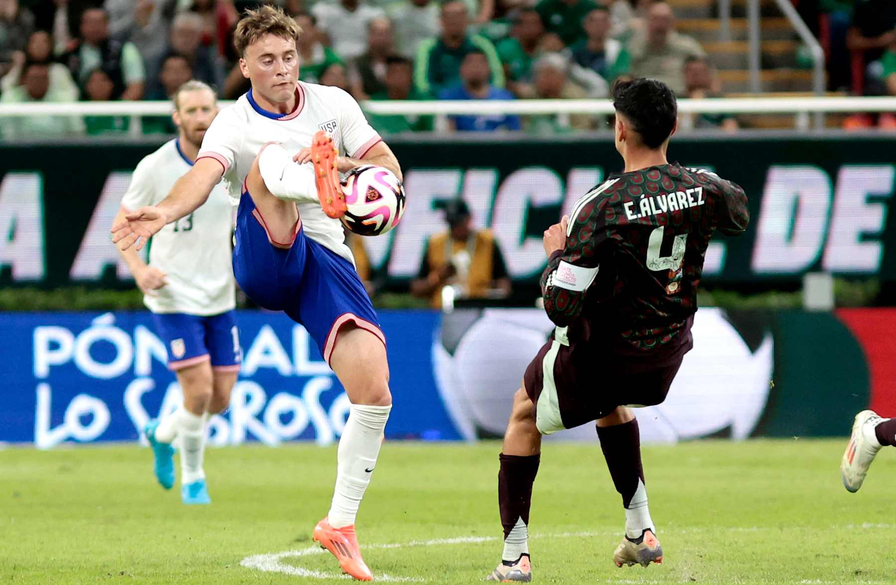 USA's midfielder #07 Aidan Morris (L) and Mexico's defender #04 Edson Alvarez fight for the ball during an international friendly football match between Mexico and USA at the Akron Stadium in Zapopan, Jalisco state, Mexico, on October 15, 2024. (Photo by Ulises Ruiz / AFP) (Photo by ULISES RUIZ/AFP via Getty Images)