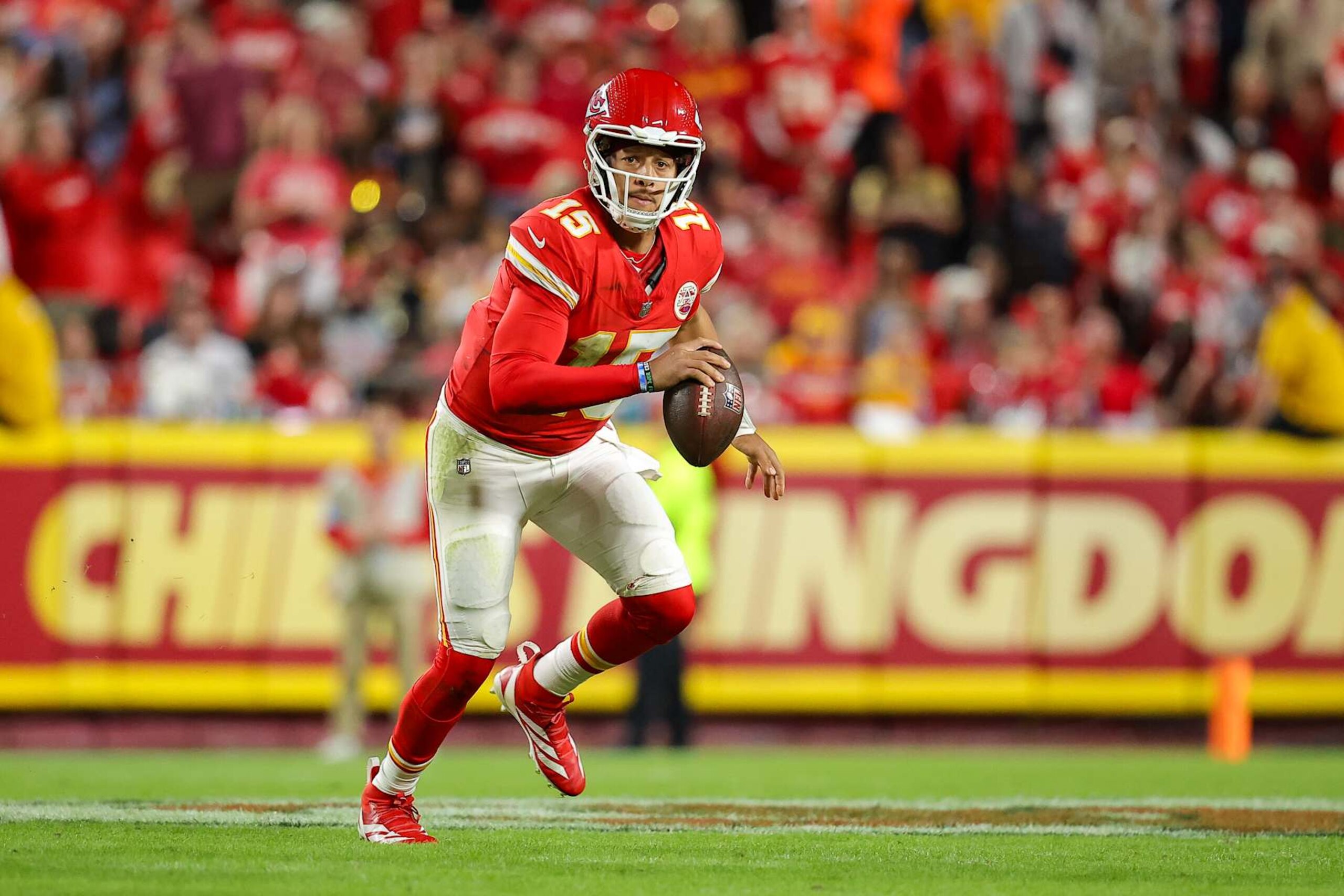 KANSAS CITY, MISSOURI - OCTOBER 7: Patrick Mahomes #15 of the Kansas City Chiefs runs with the football during the second quarter against the New Orleans Saints at GEHA Field at Arrowhead Stadium on October 7, 2024 in Kansas City, Missouri. (Photo by David Eulitt/Getty Images)