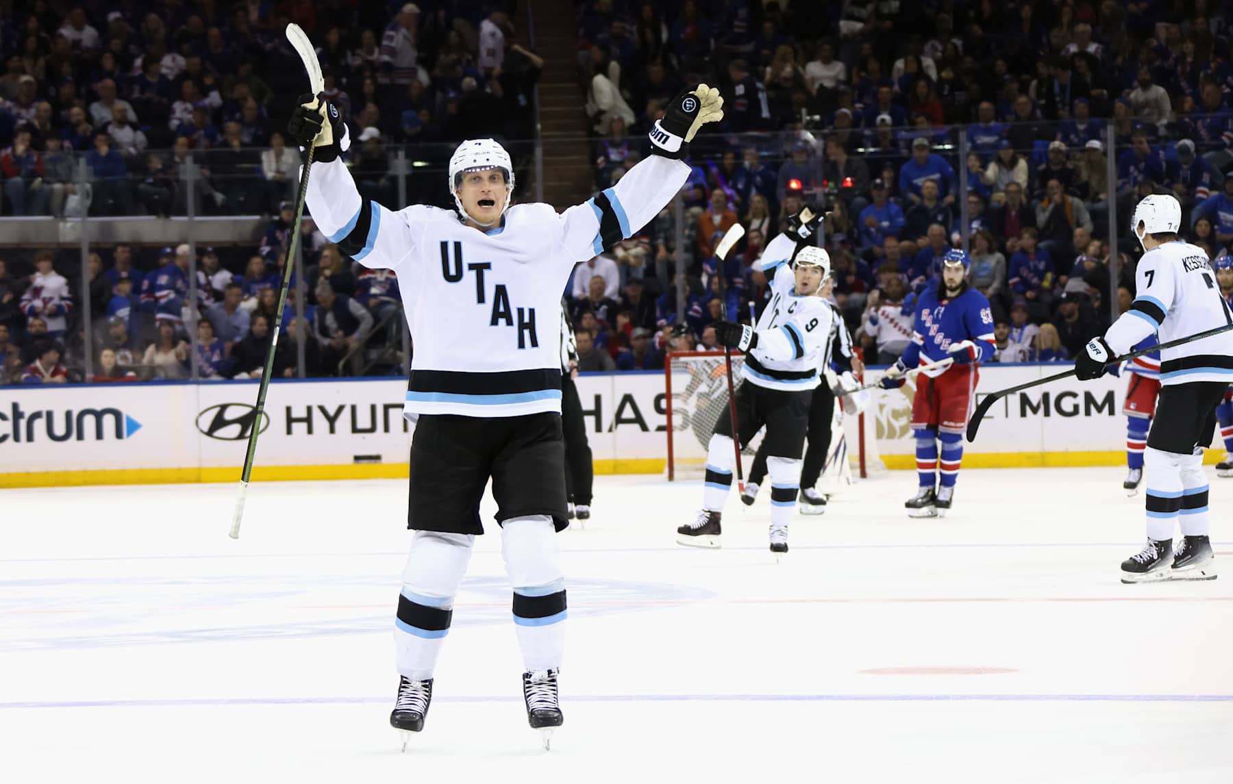 NEW YORK, NEW YORK - OCTOBER 12: Juuso Valimaki #4 of Utah Hockey Club of the Utah Hockey Club celebrate a 6-5 overtime win over the New York Rangers at Madison Square Garden on October 12, 2024 in New York City. (Photo by Bruce Bennett/Getty Images)