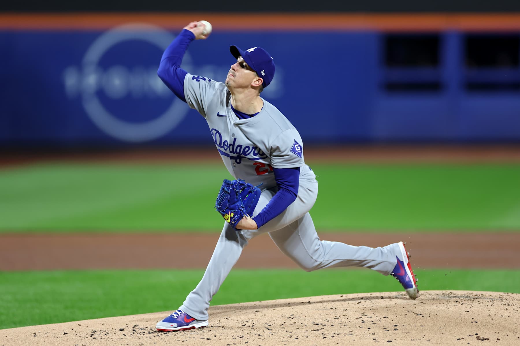 NEW YORK, NEW YORK - OCTOBER 16: Walker Buehler #21 of the Los Angeles Dodgers pitches in the first inning against the New York Mets during Game Three of the National League Championship Series at Citi Field on October 16, 2024 in New York City. (Photo by Sarah Stier/Getty Images)