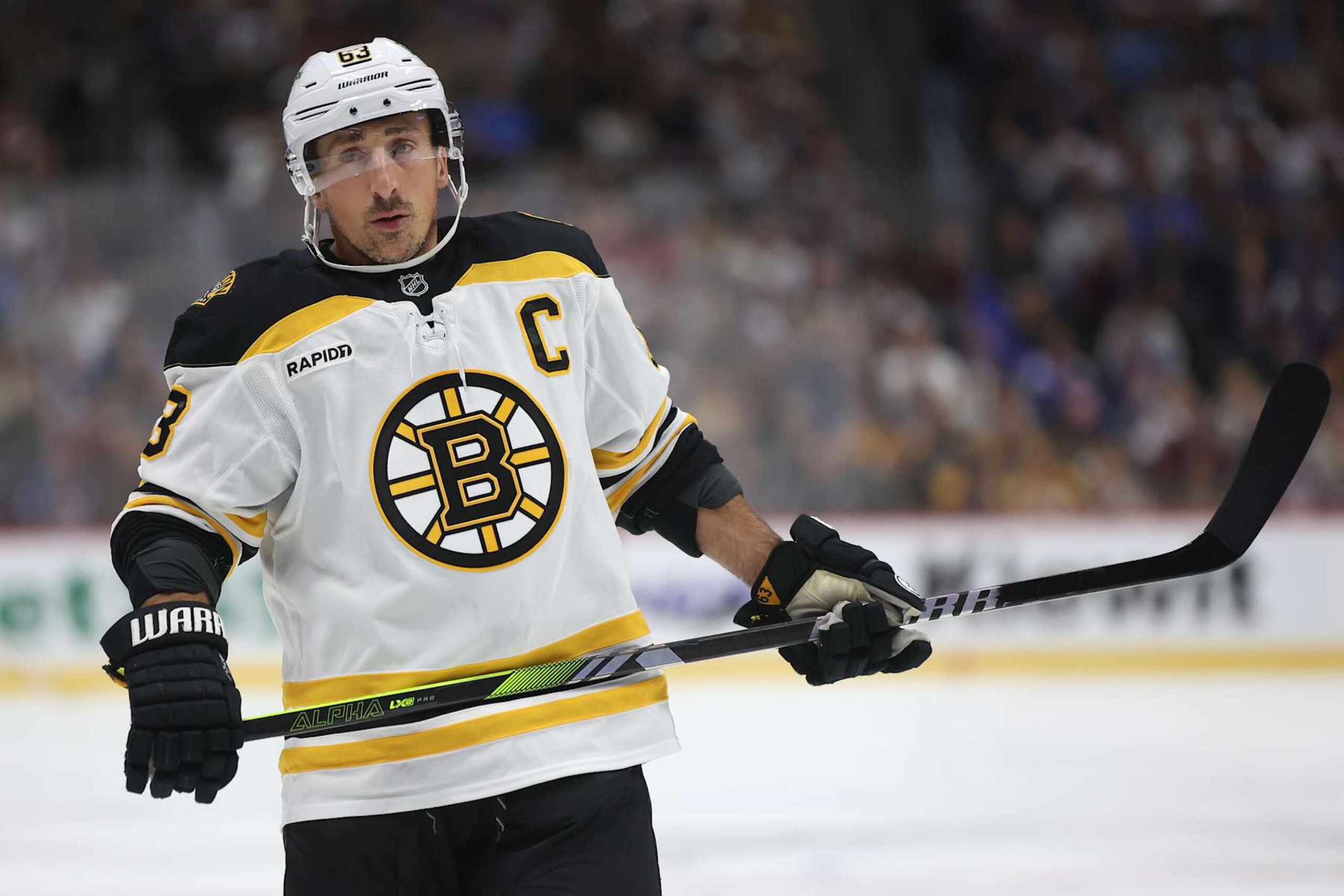DENVER, COLORADO - OCTOBER 16: Brad Marchand #63 of the Boston Bruins plays the Colorado Avalanche in the first period at Ball Arena on October 16, 2024 in Denver, Colorado. (Photo by Matthew Stockman/Getty Images)