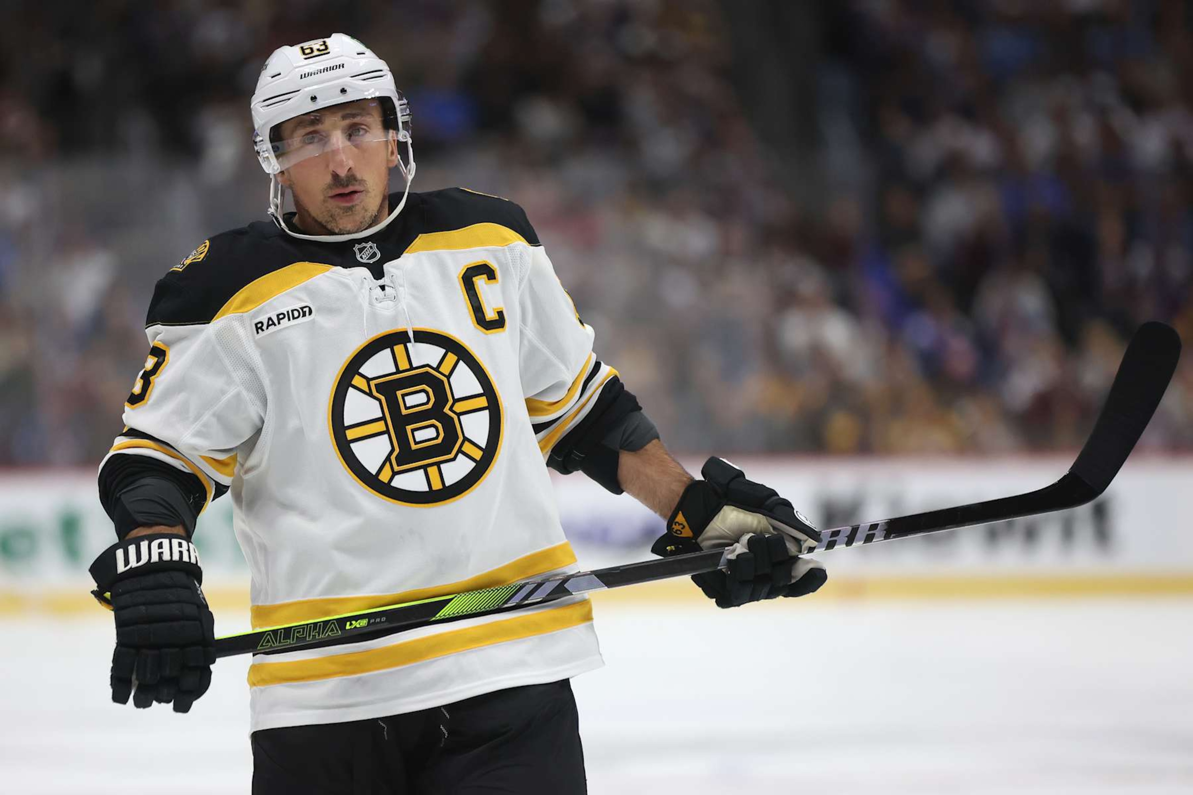 DENVER, COLORADO - OCTOBER 16: Brad Marchand #63 of the Boston Bruins plays the Colorado Avalanche in the first period at Ball Arena on October 16, 2024 in Denver, Colorado. (Photo by Matthew Stockman/Getty Images) DENVER, COLORADO - OCTOBER 16: Brad Marchand #63 of the Boston Bruins plays the Colorado Avalanche in the first period at Ball Arena on October 16, 2024 in Denver, Colorado. (Photo by Matthew Stockman/Getty Images)
