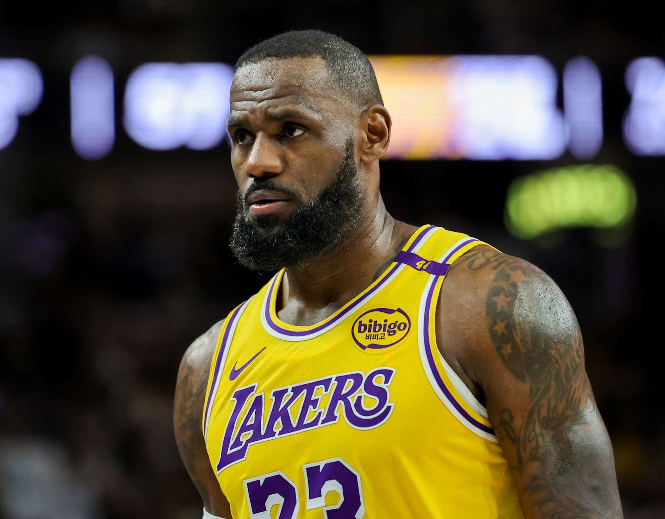LAS VEGAS, NEVADA - OCTOBER 15: LeBron James #23 of the Los Angeles Lakers walks on the court during a break in the third quarter of a preseason game against the Golden State Warriors at T-Mobile Arena at T-Mobile Arena on October 15, 2024 in Las Vegas, Nevada. The Warriors defeated the Lakers 111-97. NOTE TO USER: User expressly acknowledges and agrees that, by downloading and or using this photograph, User is consenting to the terms and conditions of the Getty Images License Agreement. (Photo by Ethan Miller/Getty Images)
