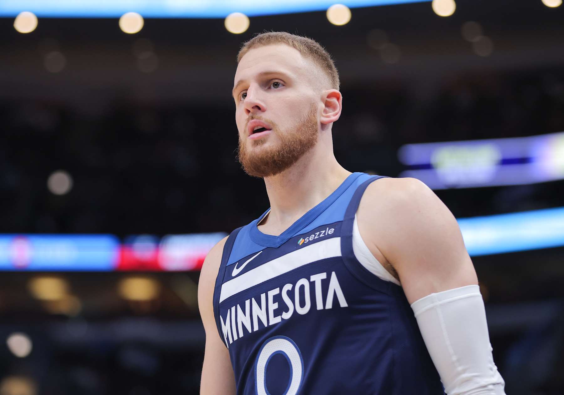 CHICAGO, IL - OCTOBER 16: Minnesota Timberwolves guard Donte DiVincenzo (0) looks on during the first half of a preseason game against the Chicago Bulls on October 16, 2024 at the United Center in Chicago, Illinois. (Photo by Melissa Tamez/Icon Sportswire via Getty Images)