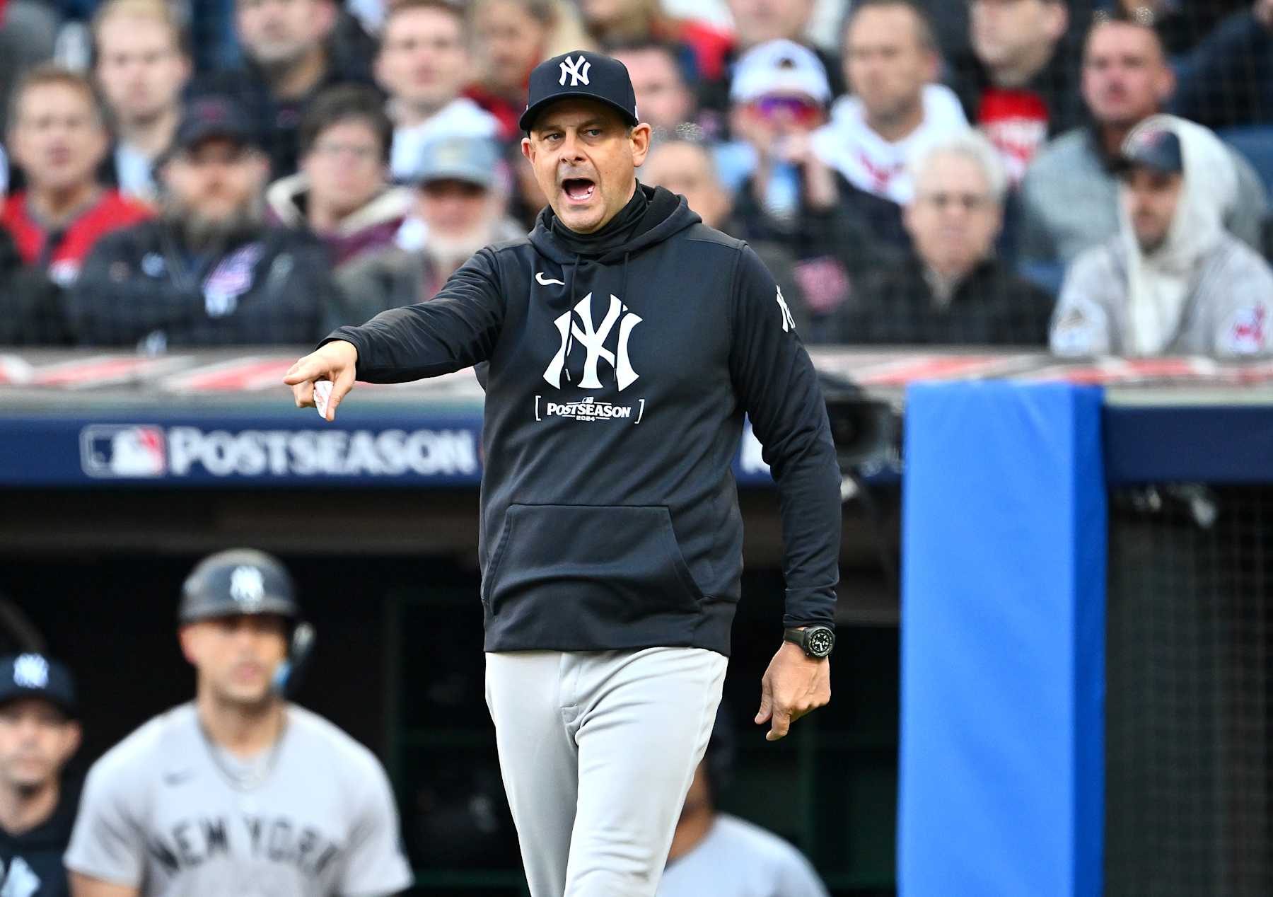 CLEVELAND, OHIO - OCTOBER 17: Manager Aaron Boone #17 of the New York Yankees reacts during the first inning against the Cleveland Guardians during Game Three of the American League Championship Series at Progressive Field on October 17, 2024 in Cleveland, Ohio. (Photo by Jason Miller/Getty Images)