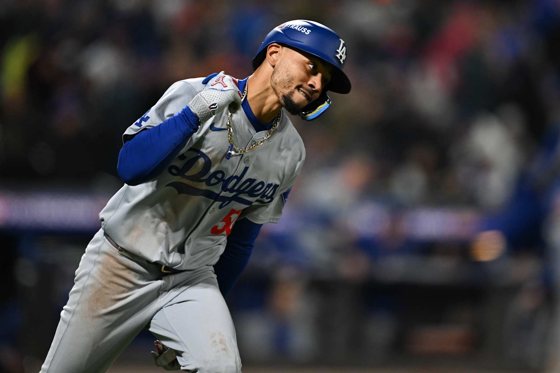 NEW YORK, NY - OCTOBER 17:   Mookie Betts #50 of the Los Angeles Dodgers rounds the bases after hitting a two RBI home run in the sixth inning during Game 4 of the NLCS presented by loanDepot between the Los Angeles Dodgers and the New York Mets at Citi Field on Thursday, October 17, 2024 in New York, New York. (Photo by Drew Hallowell/MLB Photos via Getty Images)