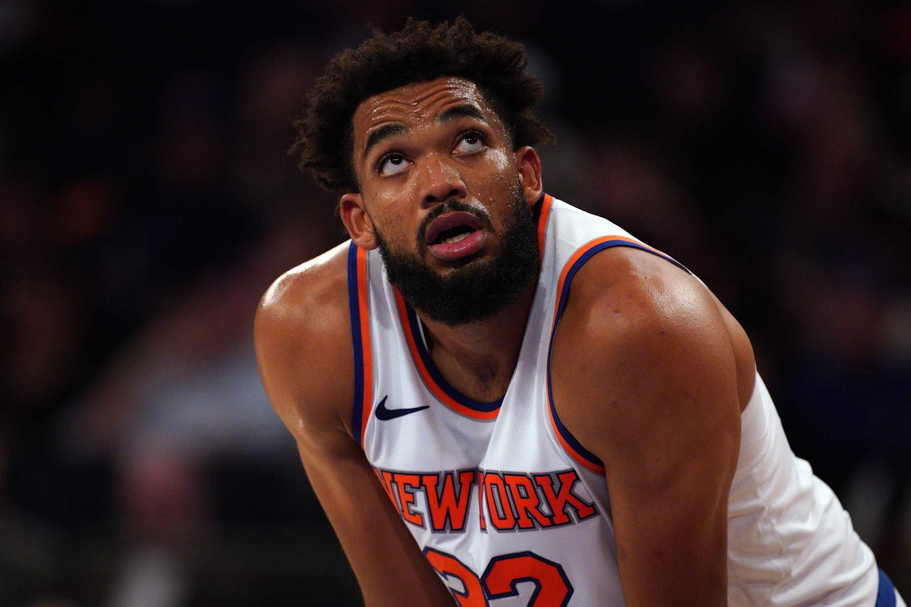 NEW YORK, NEW YORK - OCTOBER 09: Karl-Anthony Towns #32 of the New York Knicks looks on against the Washington Wizards during the second half of a preseason game at Madison Square Garden on October 09, 2024 in New York City. NOTE TO USER: User expressly acknowledges and agrees that, by downloading and or using this Photograph, user is consenting to the terms and conditions of the Getty Images License Agreement. (Photo by Evan Bernstein/Getty Images)