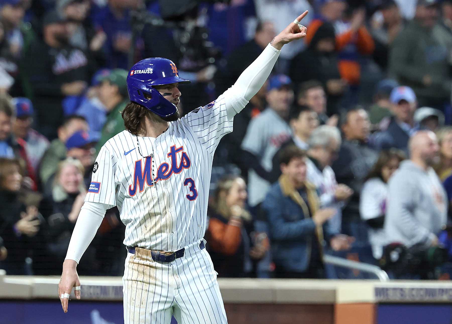NEW YORK, NEW YORK - OCTOBER 18: Jesse Winker #3 of the New York Mets reacts after scoring in the third inning against the Los Angeles Dodgers during Game Five of the National League Championship Series at Citi Field on October 18, 2024 in New York City. (Photo by Al Bello/Getty Images)