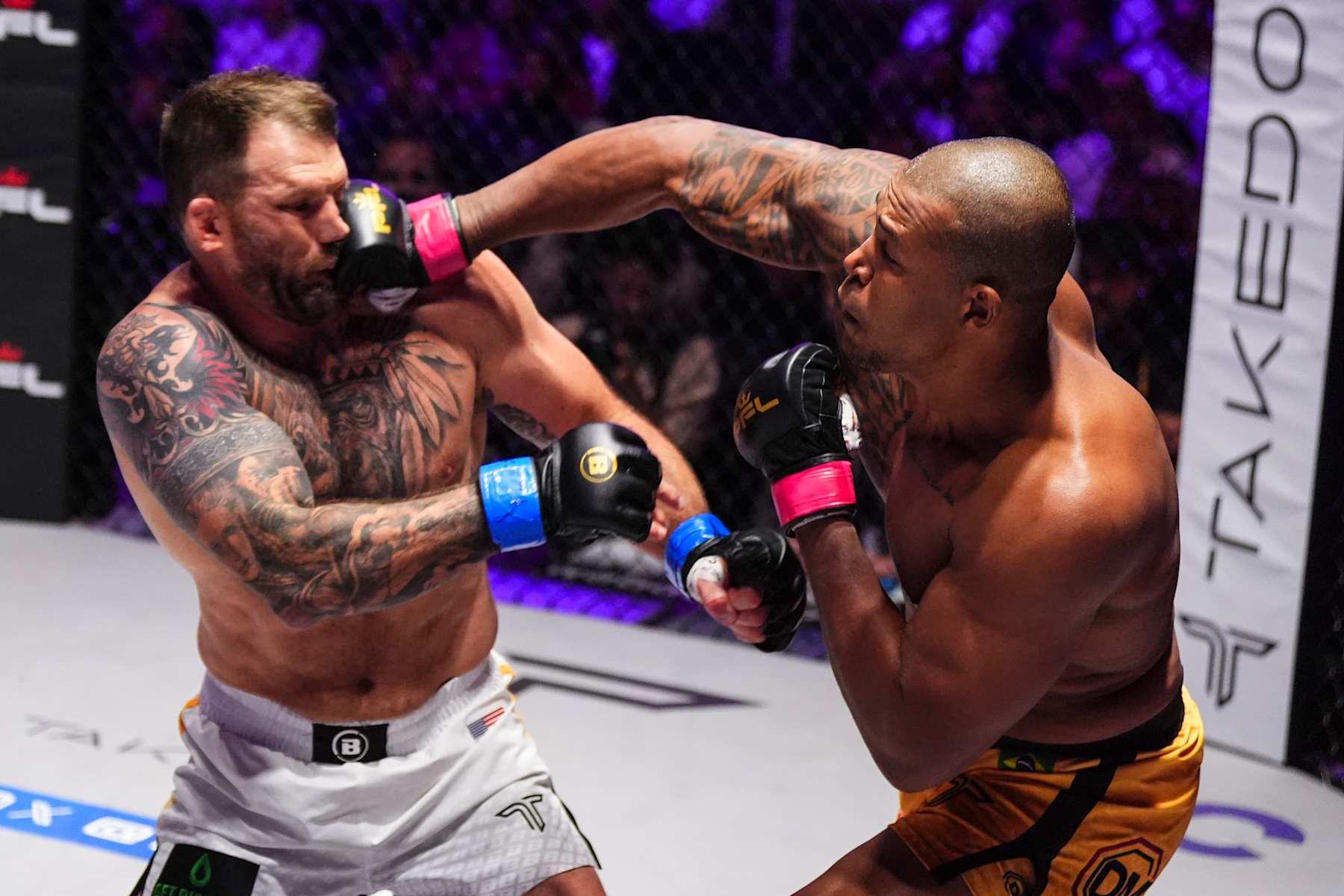 Renan Ferreira lands a punch against Ryan Bader