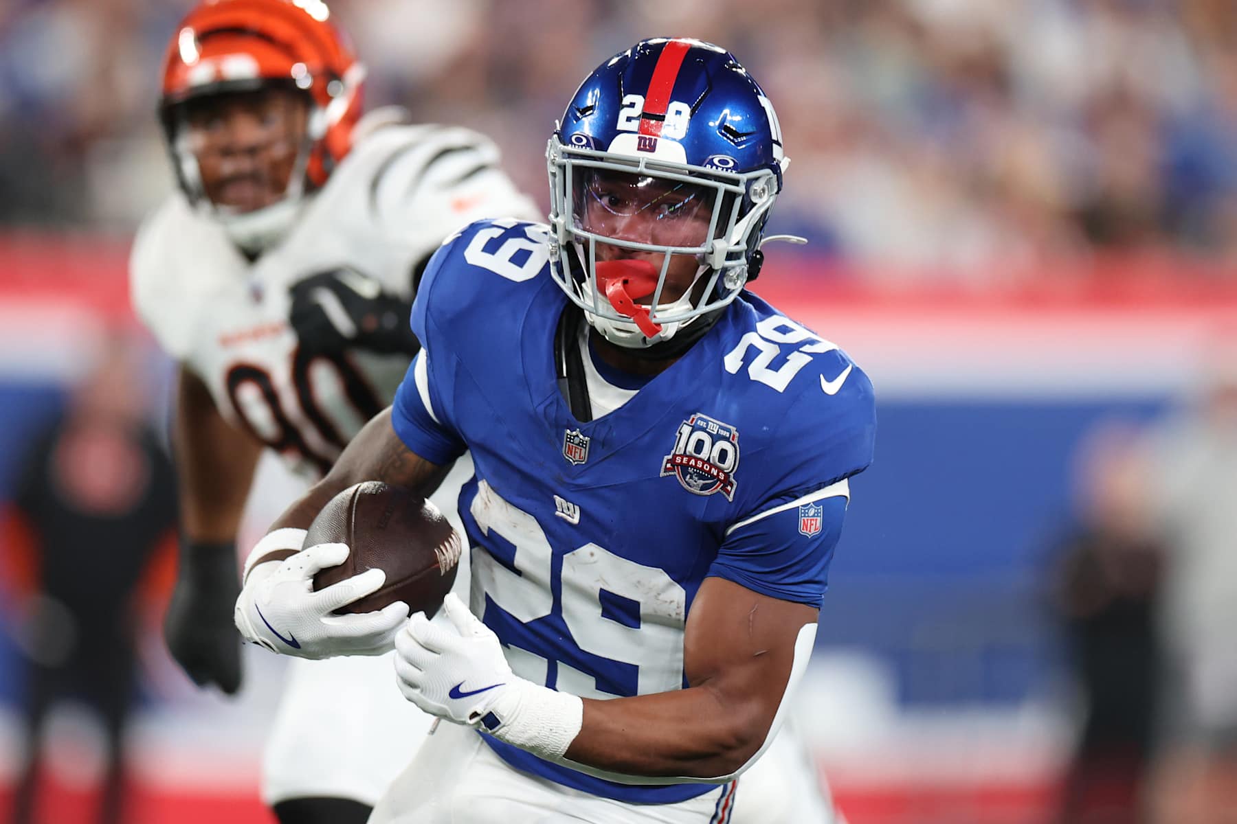 EAST RUTHERFORD, NEW JERSEY - OCTOBER 13: Tyrone Tracy Jr. #29 of the New York Giants runs the ball during the first half against the Cincinnati Bengals at MetLife Stadium on October 13, 2024 in East Rutherford, New Jersey. (Photo by Luke Hales/Getty Images)