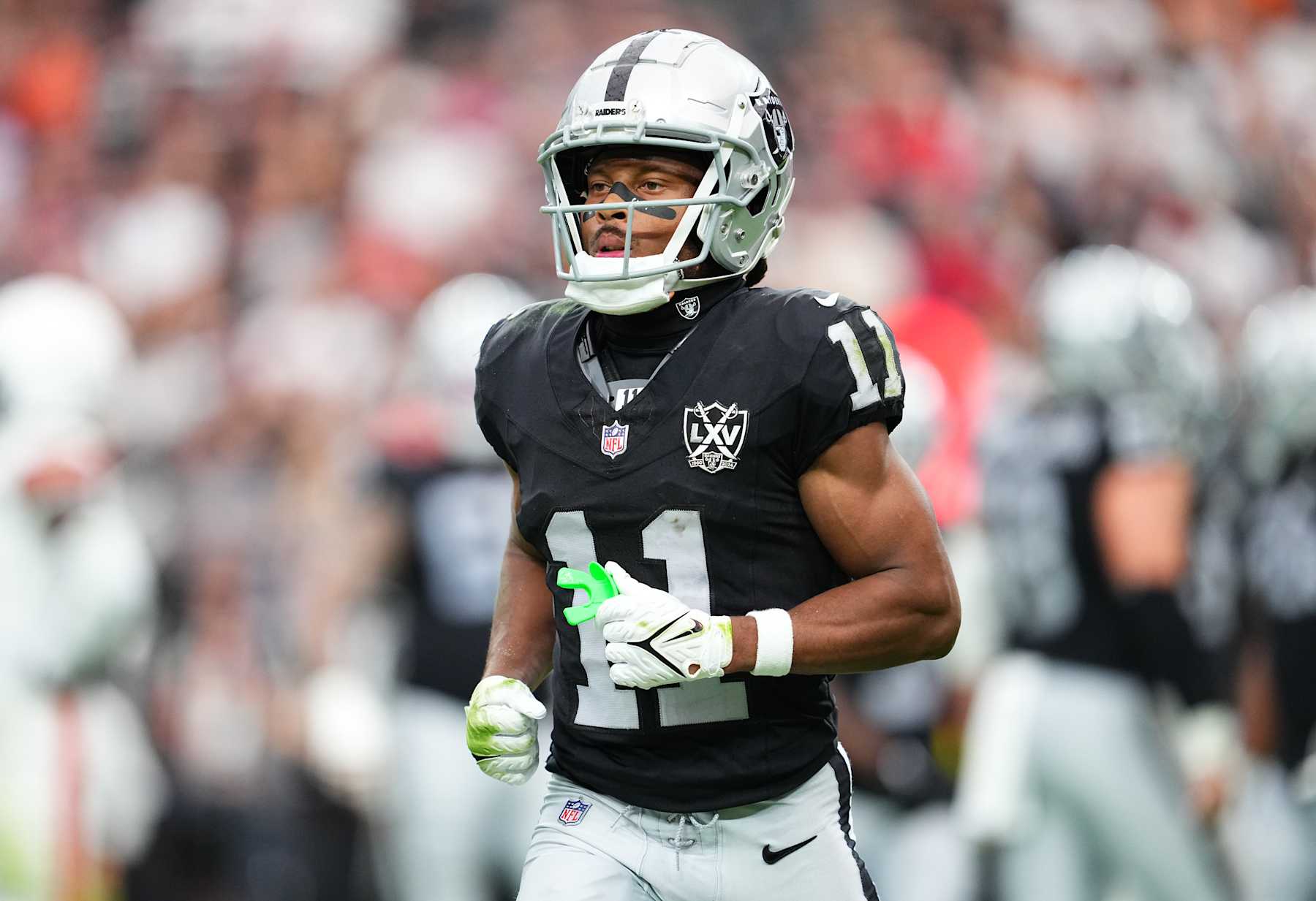 LAS VEGAS, NEVADA - SEPTEMBER 29: Wide receiver Tre Tucker #11 of the Las Vegas Raiders runs off the field during the game against the Cleveland Browns at Allegiant Stadium on September 29, 2024 in Las Vegas, Nevada. The Raiders defeated the Browns 20-16. (Photo by Jeff Bottari/Getty Images)