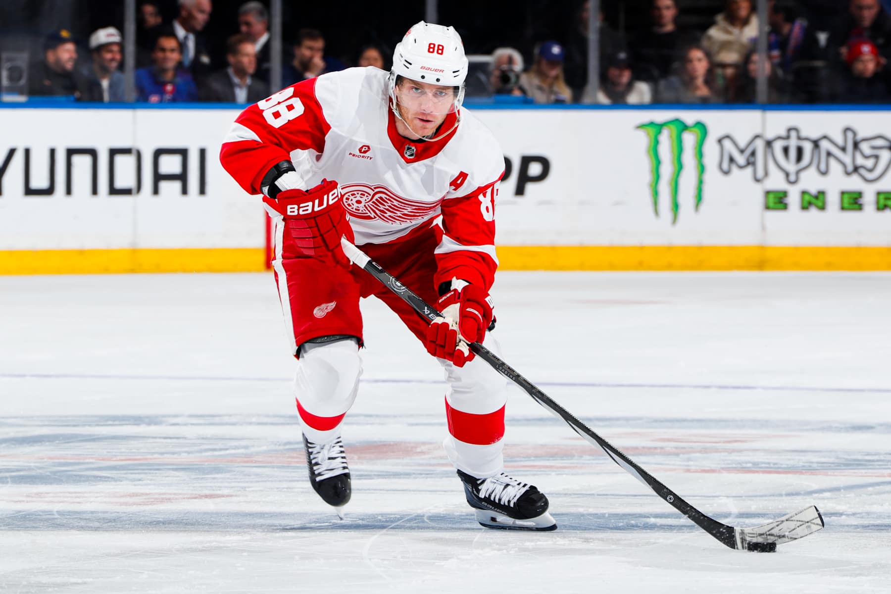 NEW YORK, NEW YORK - OCTOBER 14:  Patrick Kane #88 of the Detroit Red Wings skates with the puck against the New York Rangers at Madison Square Garden on October 14, 2024 in New York City. (Photo by Jared Silber/NHLI via Getty Images)