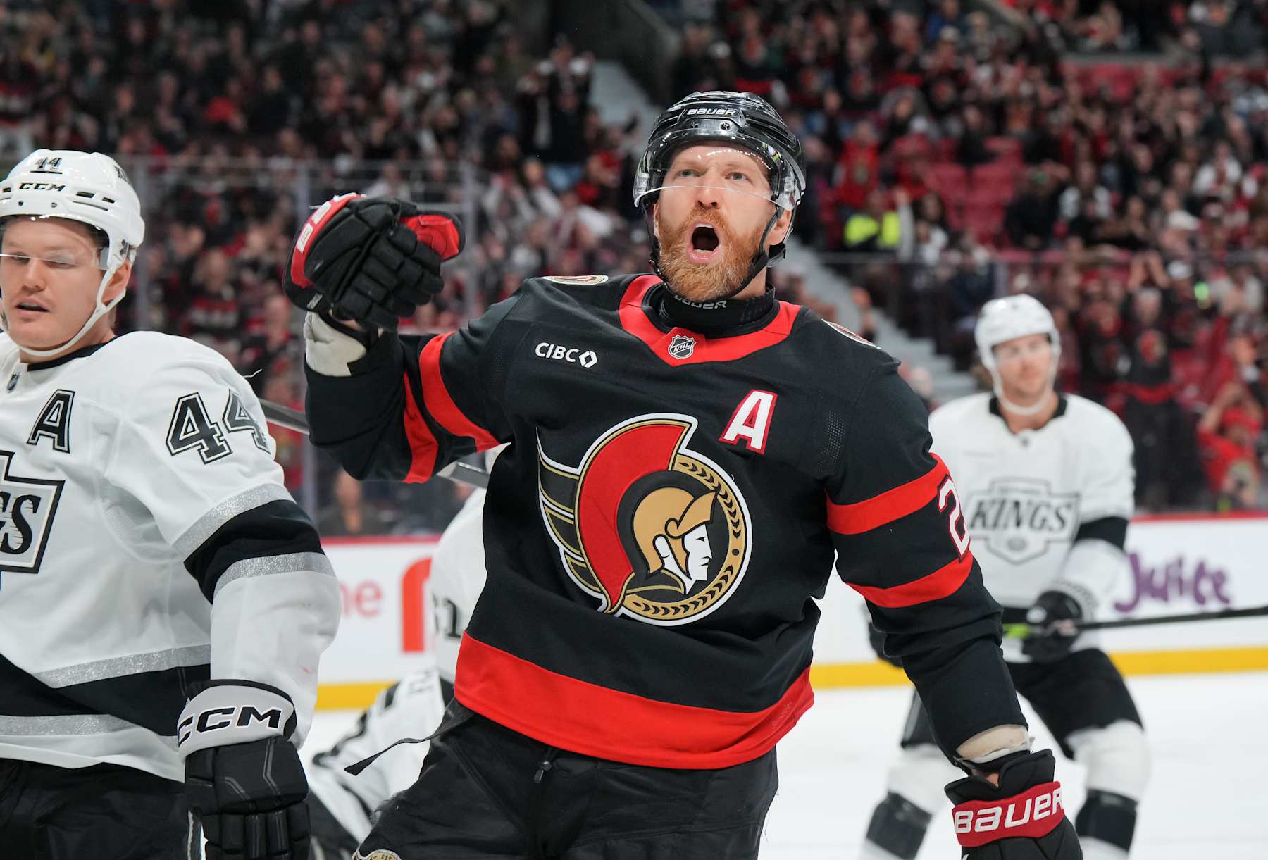 OTTAWA, CANADA - OCTOBER 14:  Claude Giroux #28 of the Ottawa Senators celebrates his third period goal as Mikey Anderson #44 of the Los Angeles Kings looks on at Canadian Tire Centre on October 14, 2024 in Ottawa, Ontario, Canada.  (Photo by André Ringuette/NHLI via Getty Images)