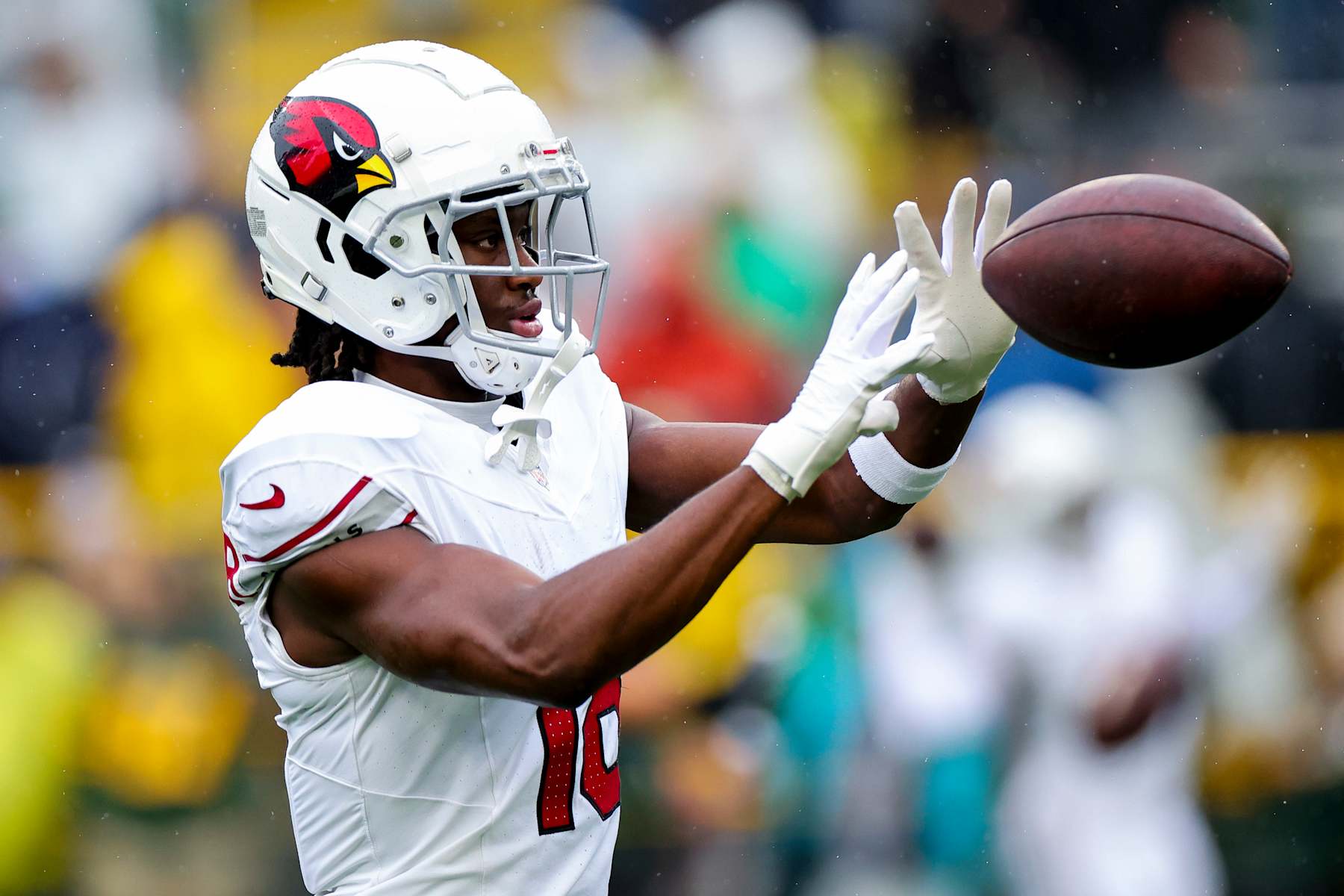 GREEN BAY, WISCONSIN - OCTOBER 13: Marvin Harrison Jr. #18 of the Arizona Cardinals warms up prior to playing the Green Bay Packers at Lambeau Field on October 13, 2024 in Green Bay, Wisconsin. (Photo by Stacy Revere/Getty Images)