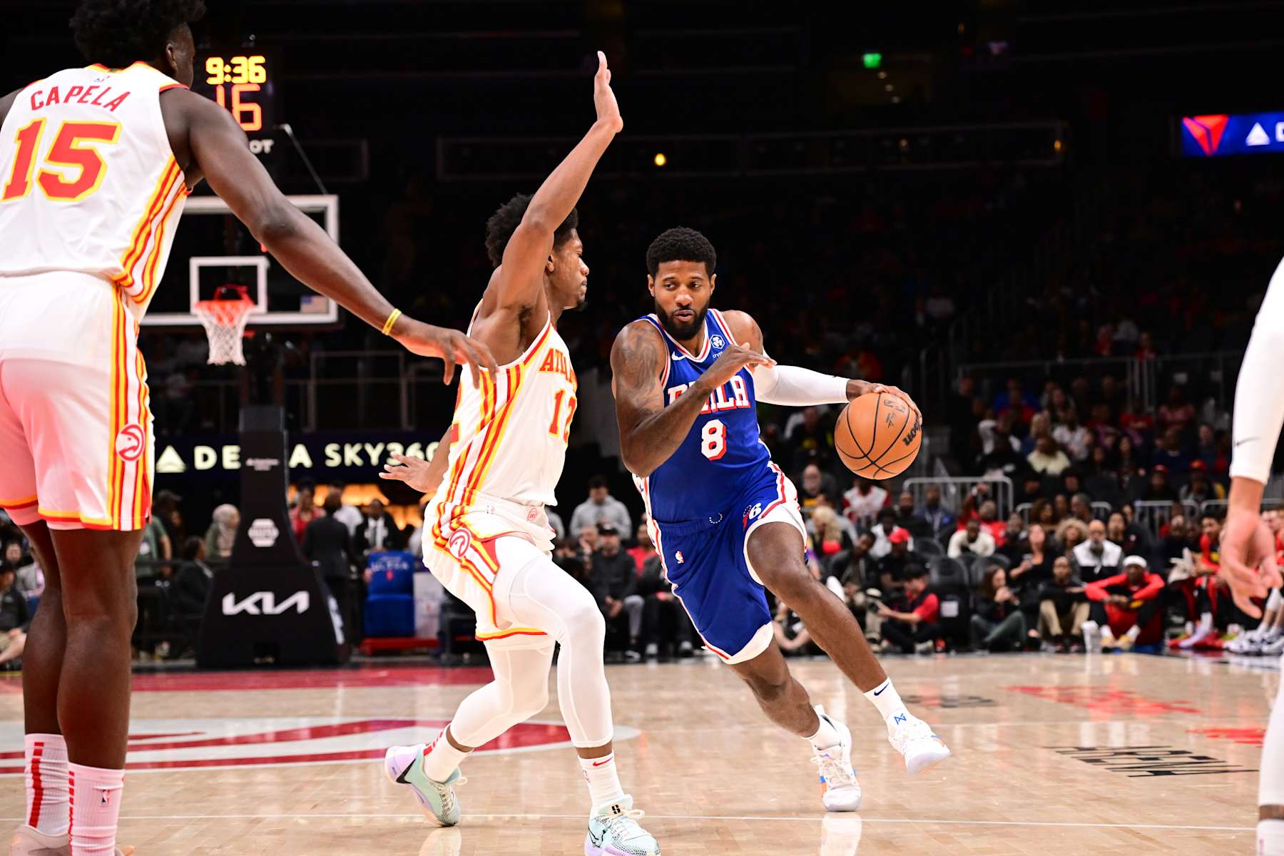 ATLANTA, GA - OCTOBER 14:  Paul George #8 of the Philadelphia 76ers drives to the basket during the game against the Atlanta Hawks during a preseason game on October 14, 2024 at State Farm Arena in Atlanta, Georgia.  NOTE TO USER: User expressly acknowledges and agrees that, by downloading and/or using this Photograph, user is consenting to the terms and conditions of the Getty Images License Agreement. Mandatory Copyright Notice: Copyright 2024 NBAE (Photo by Adam Hagy/NBAE via Getty Images)