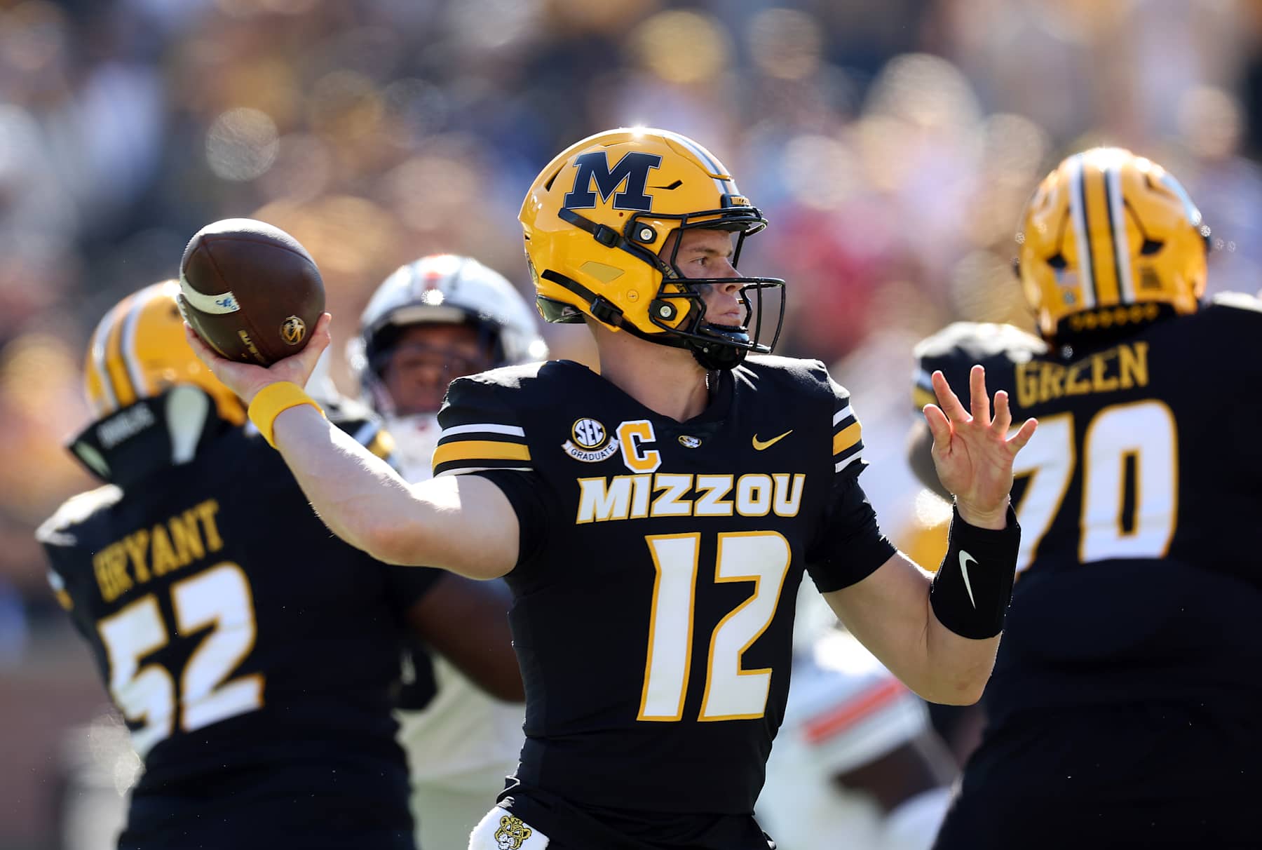 COLUMBIA, MISSOURI - OCTOBER 19:  Brady Cook #12 of the Missouri Tigers passes during the 1st half of the game against the Auburn Tigers at Faurot Field/Memorial Stadium on October 19, 2024 in Columbia, Missouri.  (Photo by Jamie Squire/Getty Images)