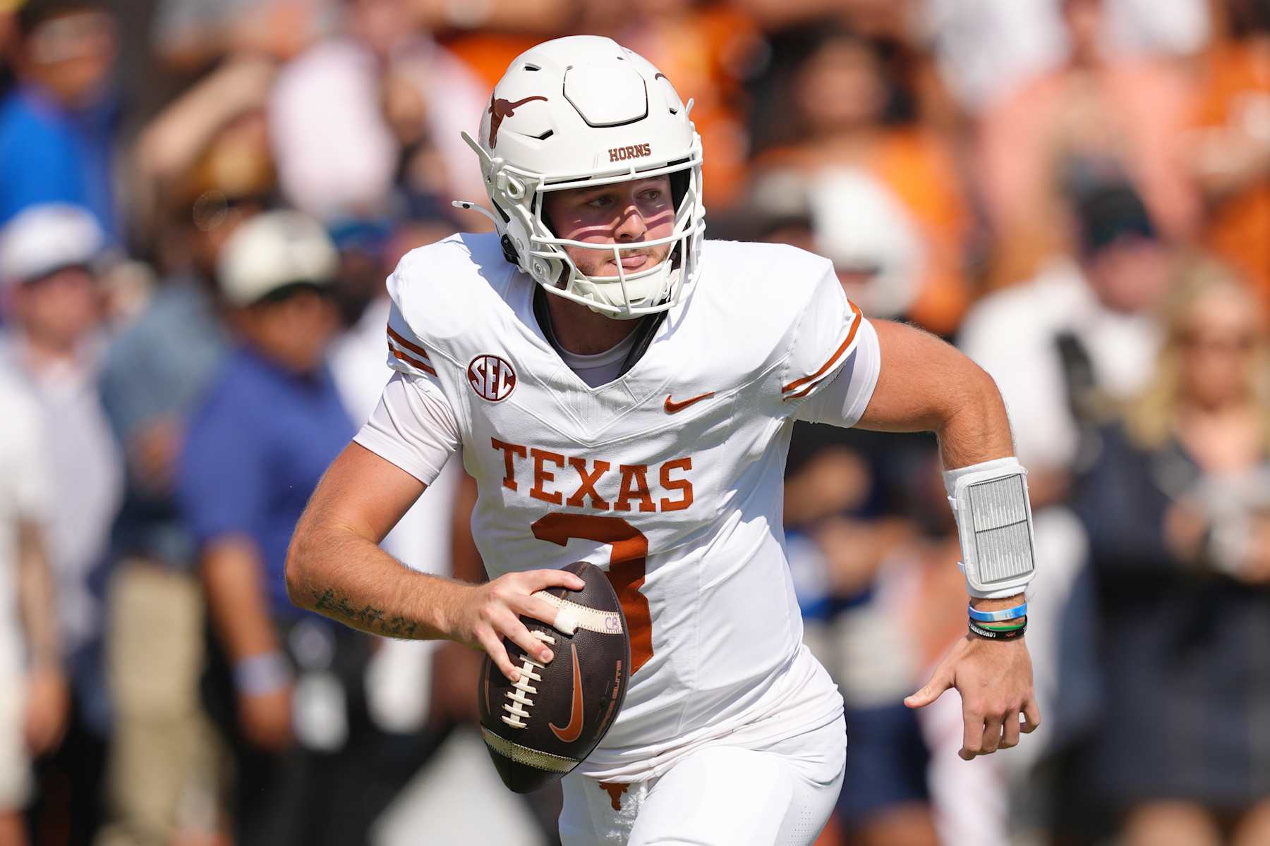 DALLAS, TEXAS - OCTOBER 12: Quinn Ewers #3 of the Texas Longhorns runs with the ball during the first half against the Oklahoma Sooners at Cotton Bowl Stadium on October 12, 2024 in Dallas, Texas. (Photo by Sam Hodde/Getty Images)