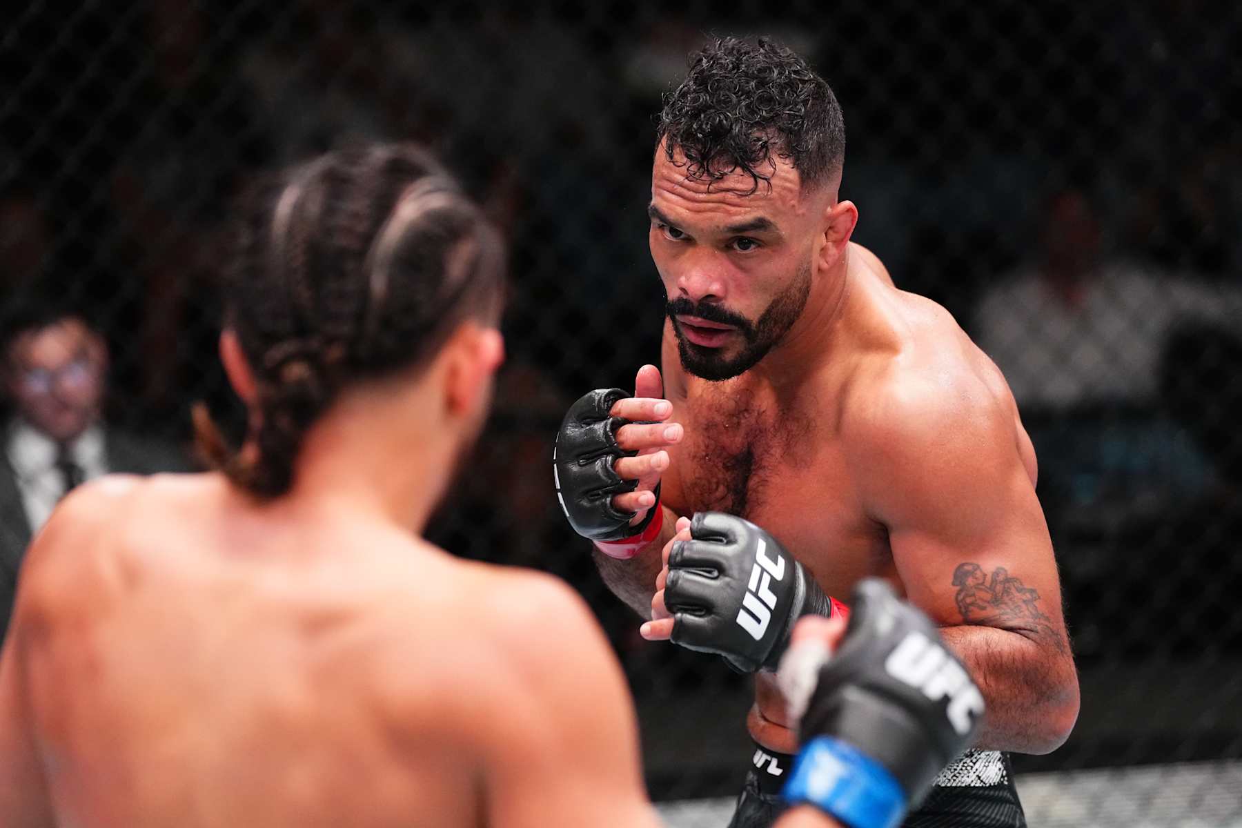 LAS VEGAS, NEVADA - OCTOBER 19: (R-L) Rob Font battles Kyler Phillips in a bantamweight fight during the UFC Fight Night event at UFC APEX on October 19, 2024 in Las Vegas, Nevada. (Photo by Jeff Bottari/Zuffa LLC)