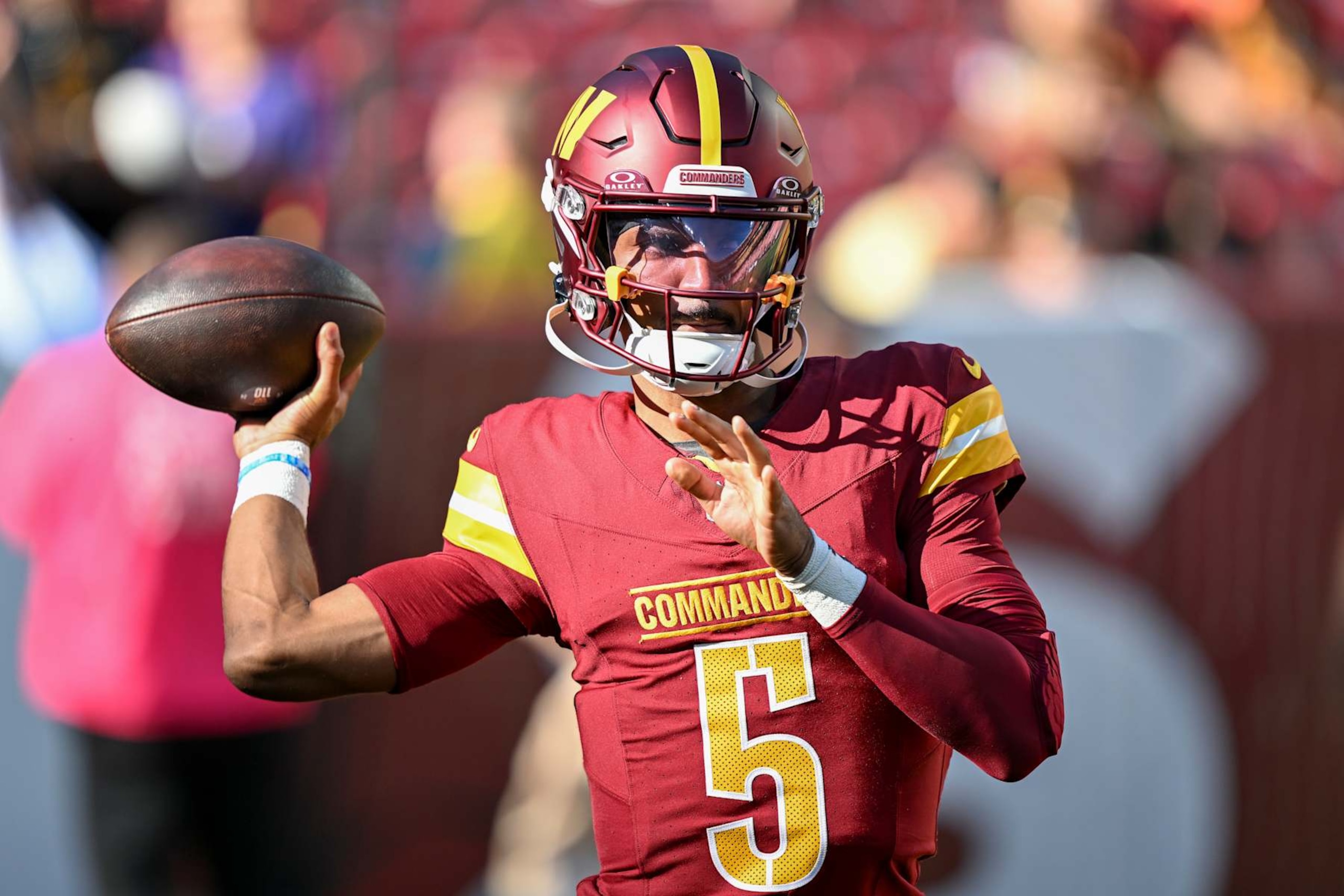 LANDOVER, MARYLAND - OCTOBER 20: Jayden Daniels #5 of the Washington Commanders warms up prior to the game against the Carolina Panthers at FedExField on October 20, 2024 in Landover, Maryland. (Photo by Greg Fiume/Getty Images)