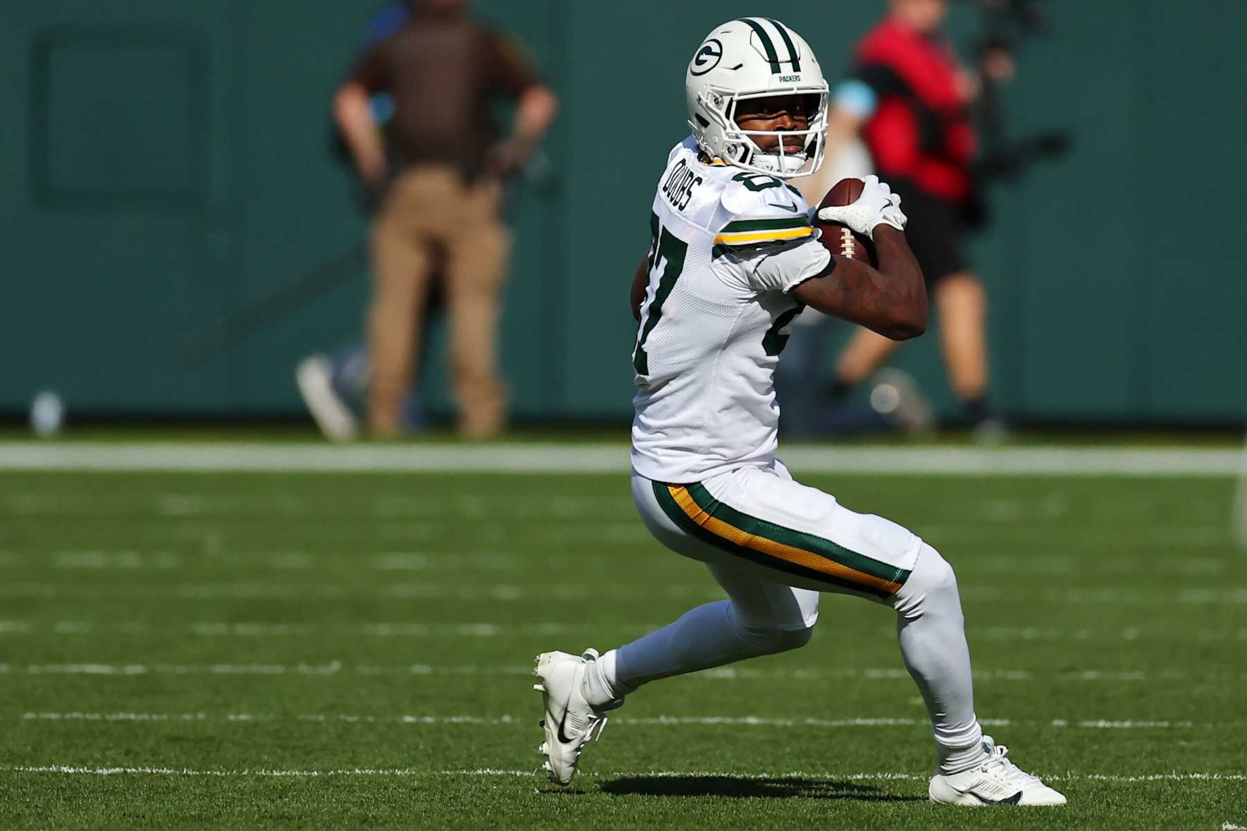 GREEN BAY, WISCONSIN - OCTOBER 20: Romeo Doubs #87 of the Green Bay Packers catches a pass in the first quarter against the Houston Texans at Lambeau Field on October 20, 2024 in Green Bay, Wisconsin. (Photo by Stacy Revere/Getty Images)