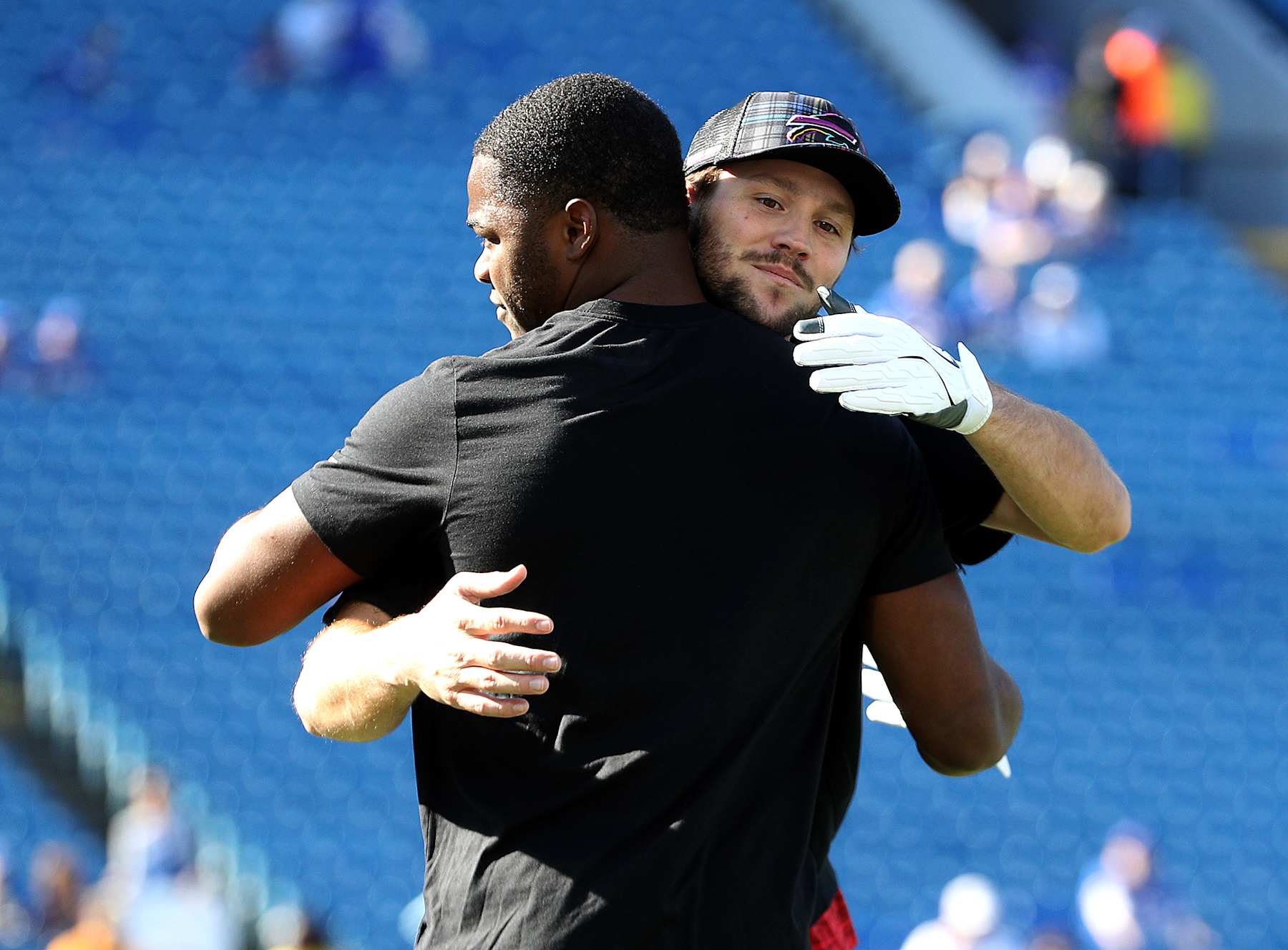 ORCHARD PARK, NEW YORK - OCTOBER 20: Amari Cooper #18 and Josh Allen #17 of the Buffalo Bills embrace prior to the game against the Tennessee Titans at Highmark Stadium on October 20, 2024 in Orchard Park, New York. (Photo by Bryan M. Bennett/Getty Images)