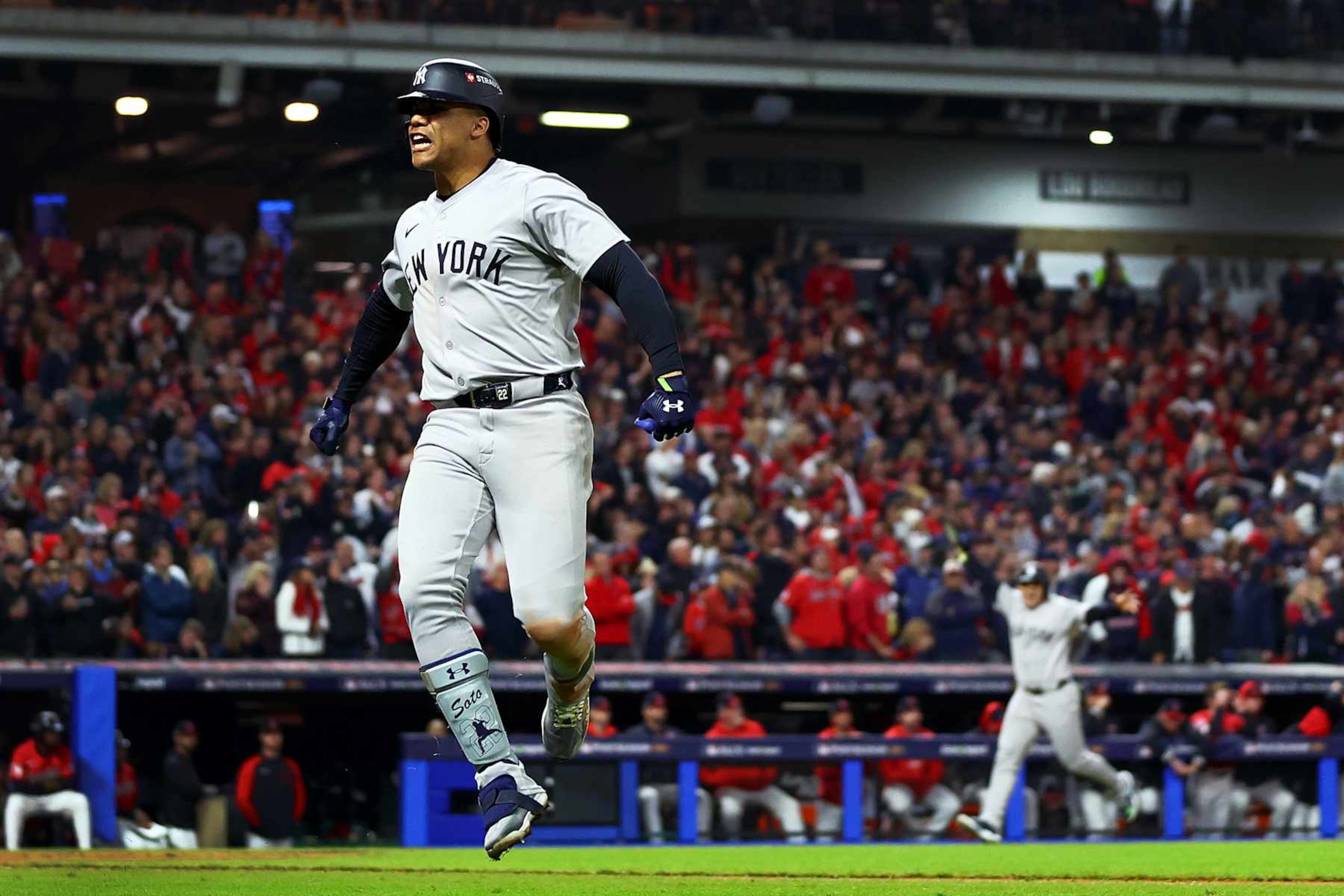 CLEVELAND, OHIO - OCTOBER 19: Juan Soto #22 of the New York Yankees celebrates after hitting a home run in the 10th inning against the Cleveland Guardians during Game Five of the American League Championship Series at Progressive Field on October 19, 2024 in Cleveland, Ohio. (Photo by Maddie Meyer/Getty Images)