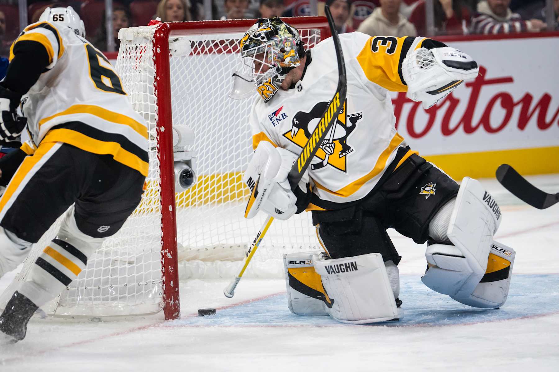 MONTREAL, QC - OCTOBER 14: Tristan Jarry (35) of the Pittsburgh Penguins makes the save during the second period of the NHL game between the Pittsburgh Penguins and the Montreal Canadiens on Oct 14, 2024, at the Bell Centre in Montreal, QC(Photo by Vincent Ethier/Icon Sportswire via Getty Images)