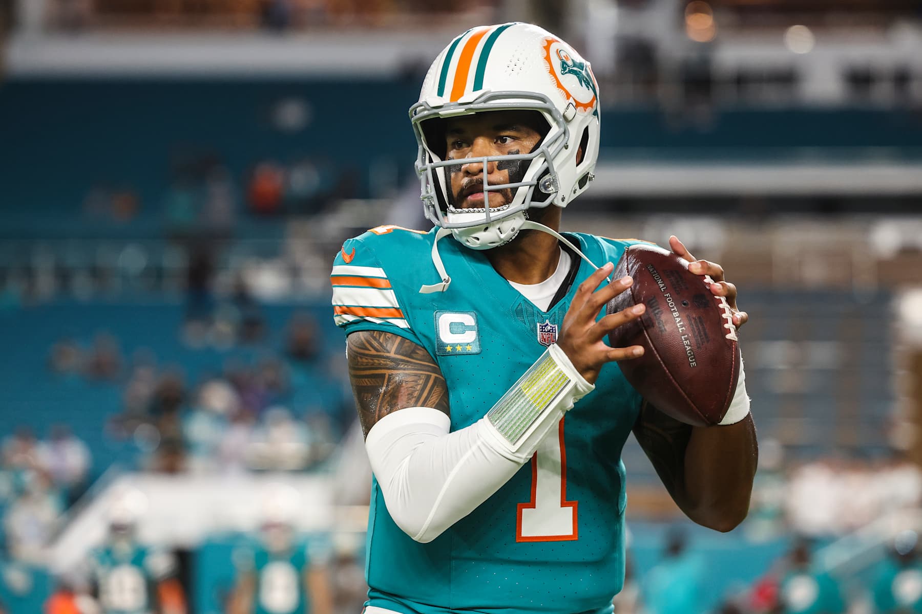 MIAMI GARDENS, FL - SEPTEMBER 12: Tua Tagovailoa #1 of the Miami Dolphins warms up prior to an NFL football game against the Buffalo Bills at Hard Rock Stadium on September 12, 2024 in Miami Gardens, FL. (Photo by Perry Knotts/Getty Images)