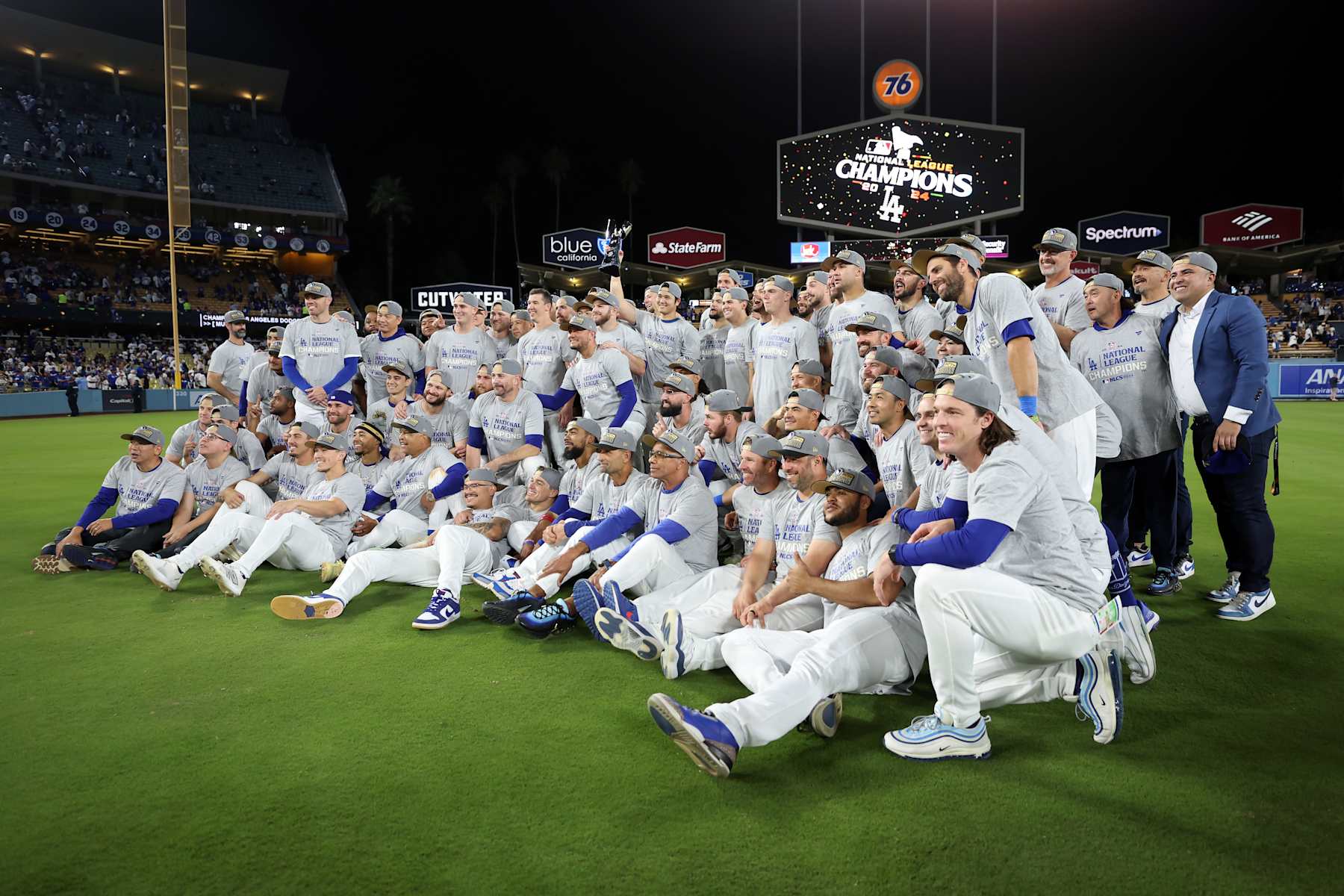 LOS ANGELES, CALIFORNIA - OCTOBER 20: The Los Angeles Dodgers pose on the field after defeating the New York Mets to win Game Six of the National League Championship Series at Dodger Stadium on October 20, 2024 in Los Angeles, California. (Photo by Sean M. Haffey/Getty Images)