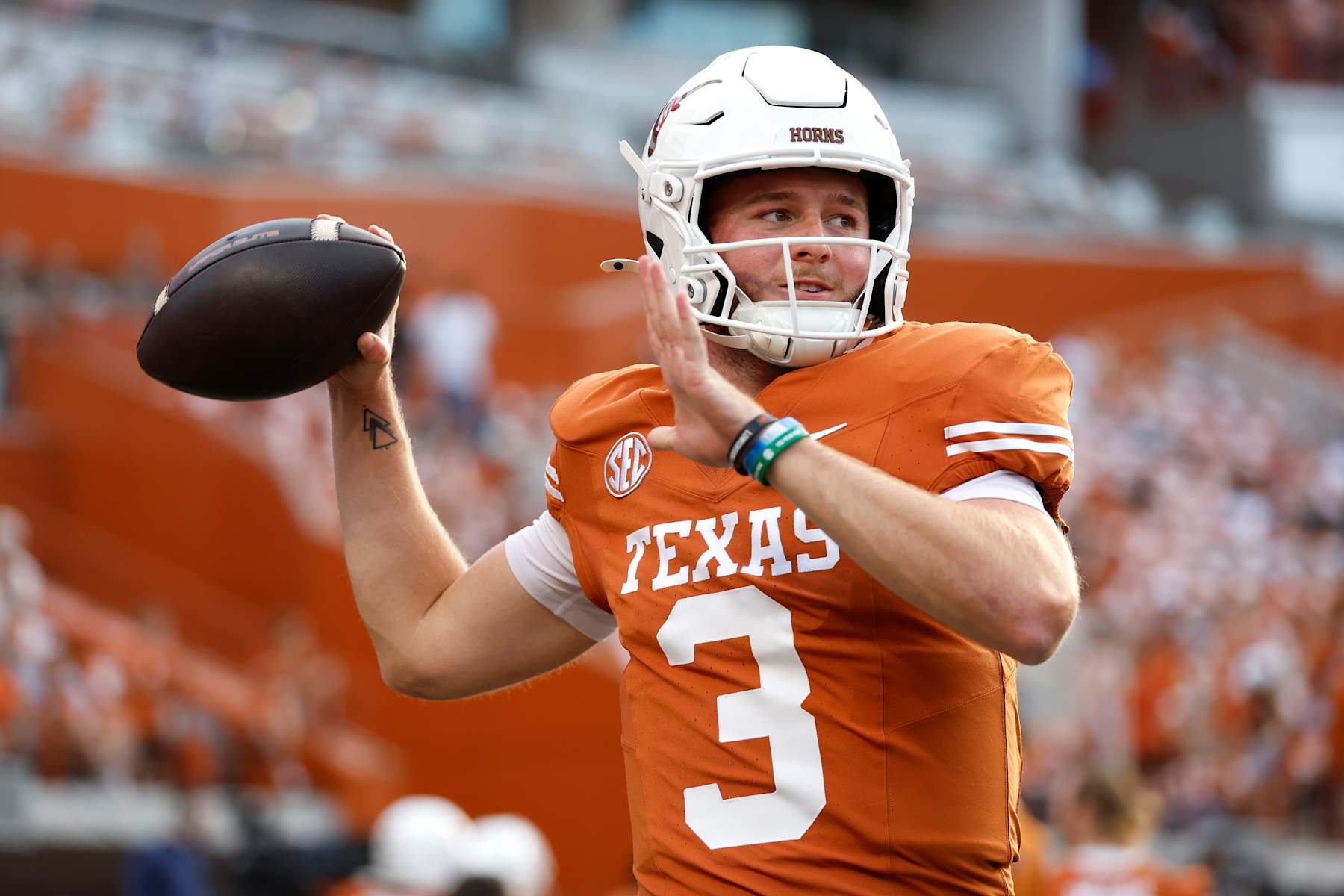 AUSTIN, TEXAS - OCTOBER 19: Quinn Ewers #3 of the Texas Longhorns warms-up prior to a game against the Georgia Bulldogs at Darrell K Royal-Texas Memorial Stadium on October 19, 2024 in Austin, Texas. (Photo by Tim Warner/Getty Images)