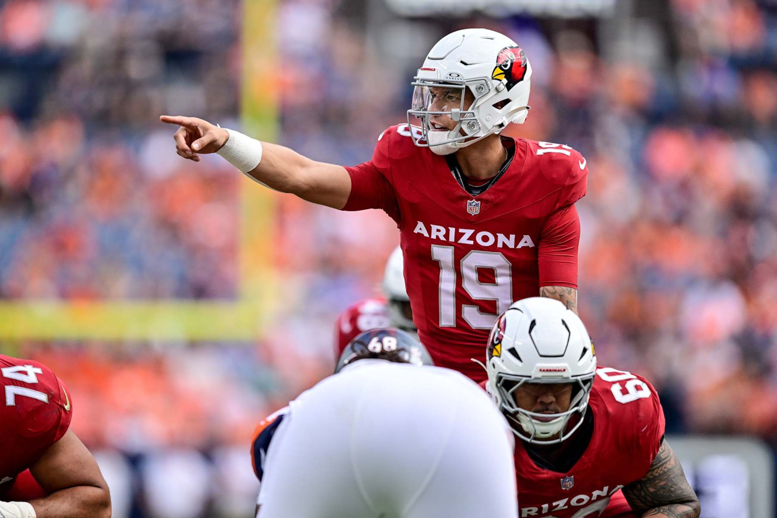 DENVER, COLORADO - AUGUST 25:  Desmond Ridder #19 of the Arizona Cardinals runs the offense in the fourth quarter against the Denver Broncos during the preseason game at Empower Field at Mile High on August 25, 2024 in Denver, Colorado. (Photo by Dustin Bradford/Getty Images)