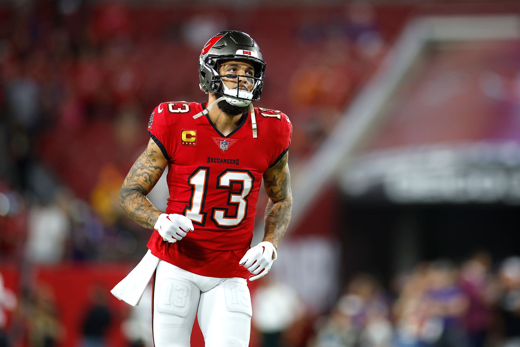TAMPA, FLORIDA - OCTOBER 21: Mike Evans #13 of the Tampa Bay Buccaneers warms up prior to a game against the Baltimore Ravens at Raymond James Stadium on October 21, 2024 in Tampa, Florida. (Photo by Mike Ehrmann/Getty Images)