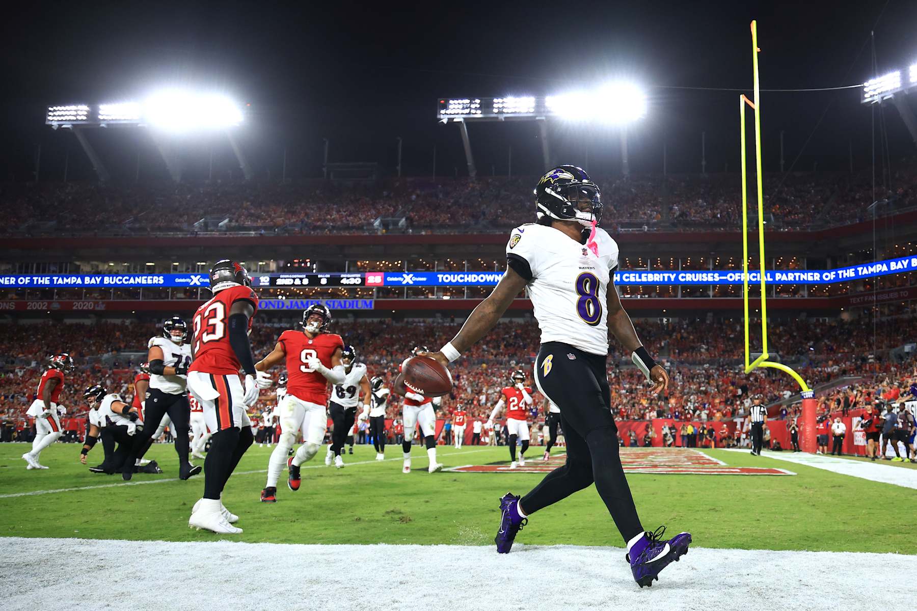 TAMPA, FLORIDA - OCTOBER 21: Lamar Jackson #8 of the Baltimore Ravens reacts after running the ball for a touchdown during the second quarter against the Tampa Bay Buccaneers at Raymond James Stadium on October 21, 2024 in Tampa, Florida. (Photo by Mike Ehrmann/Getty Images)